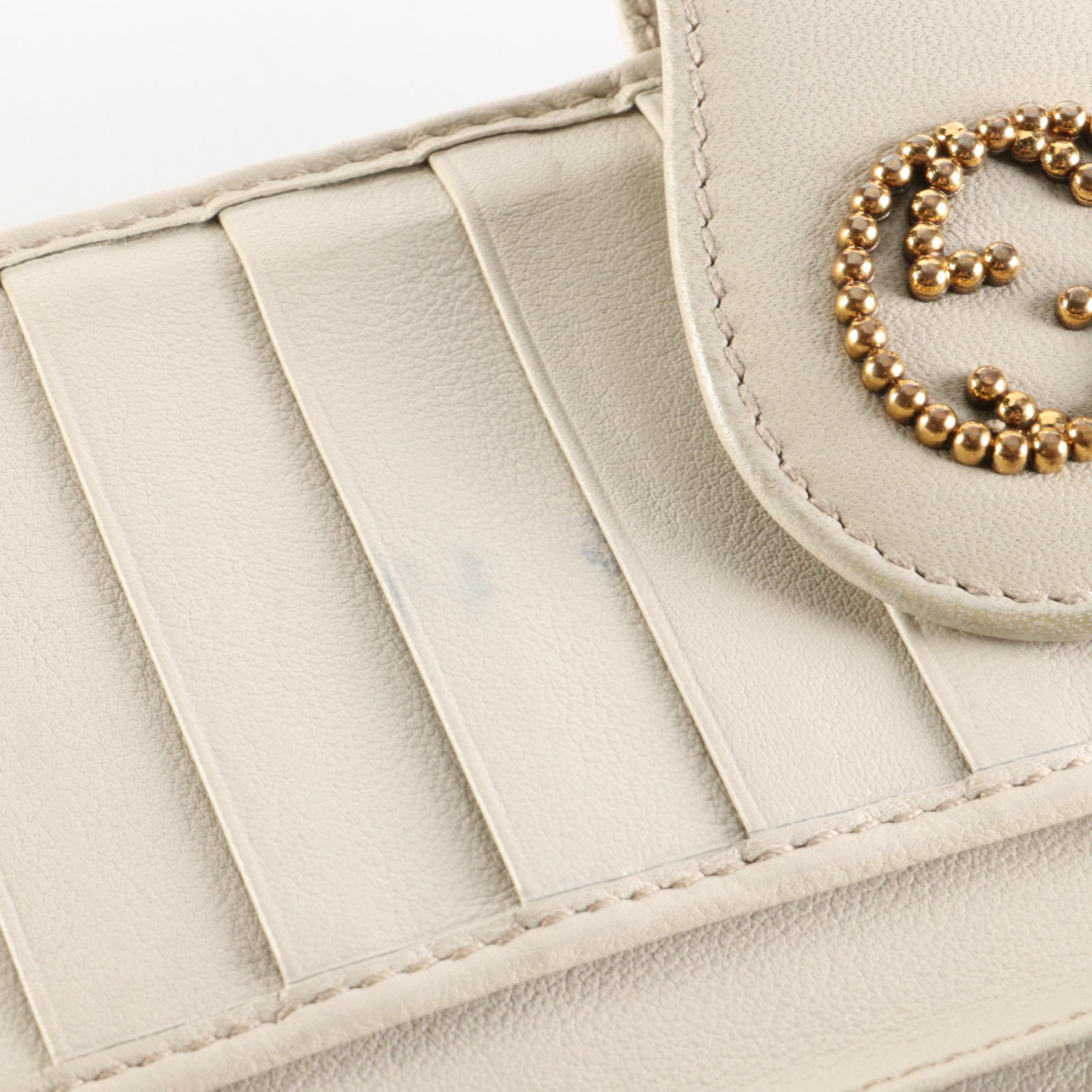 Gucci GG Embossed Leather Wallet