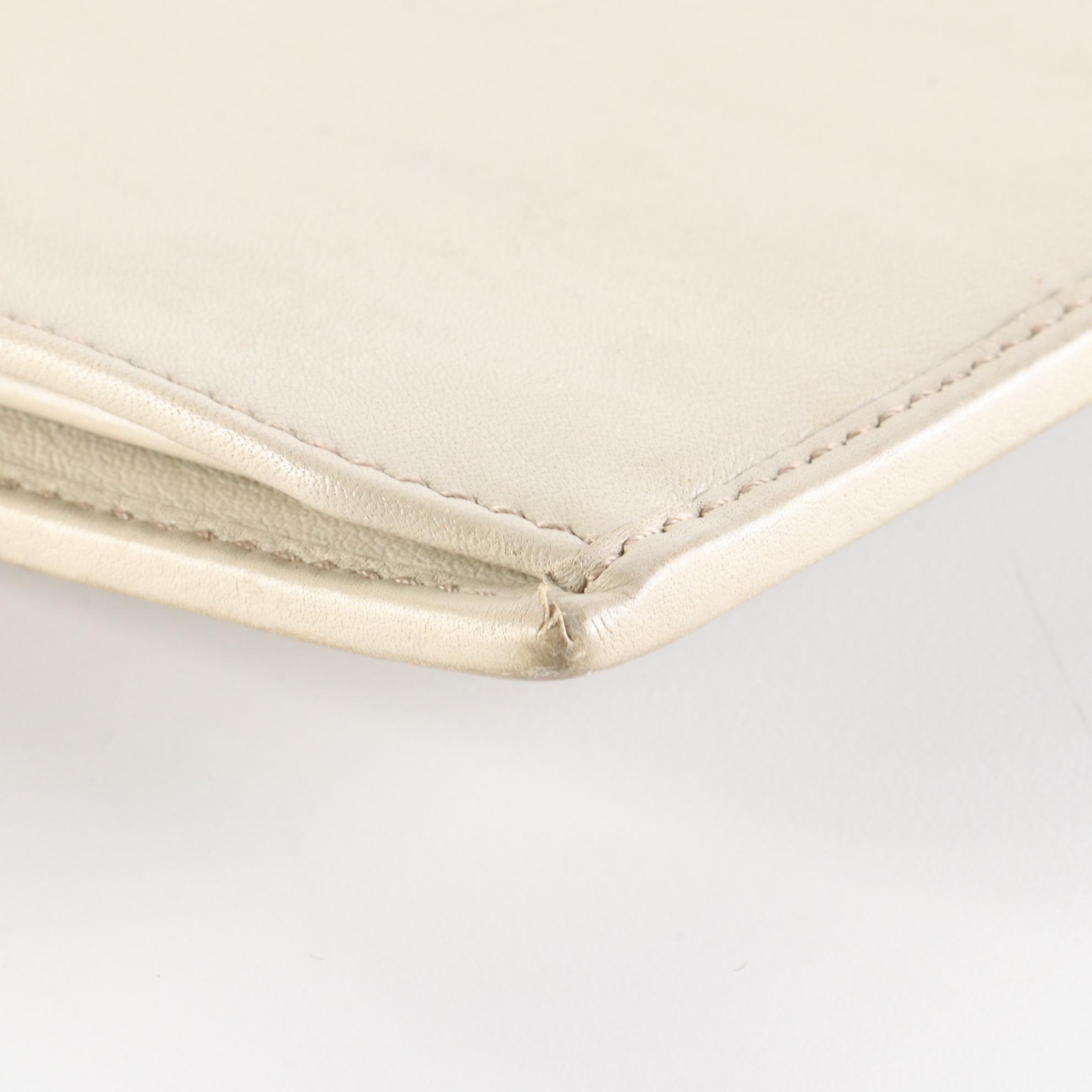 Gucci GG Embossed Leather Wallet