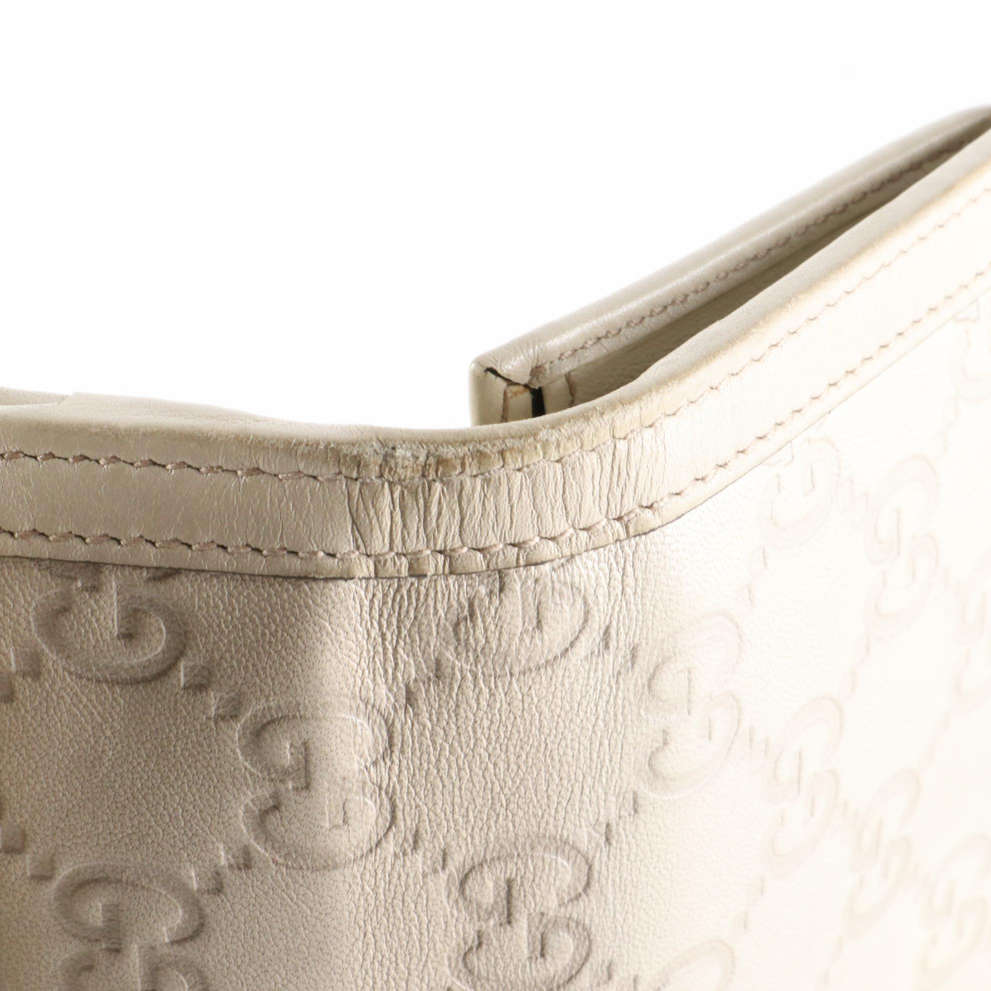 Gucci GG Embossed Leather Wallet