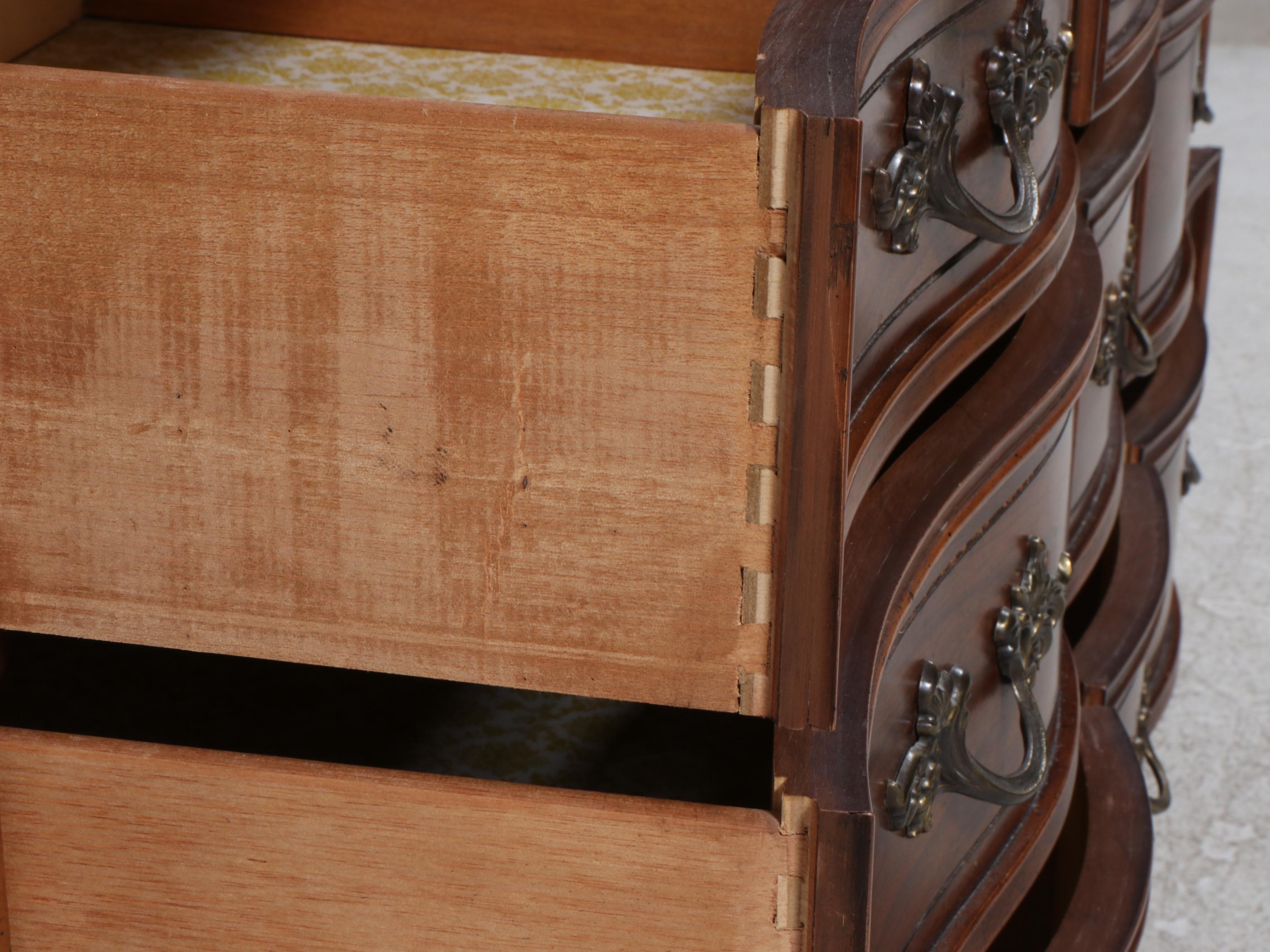 Dixie French Provincial Style Fruitwood-Stained Nine-Drawer Dresser