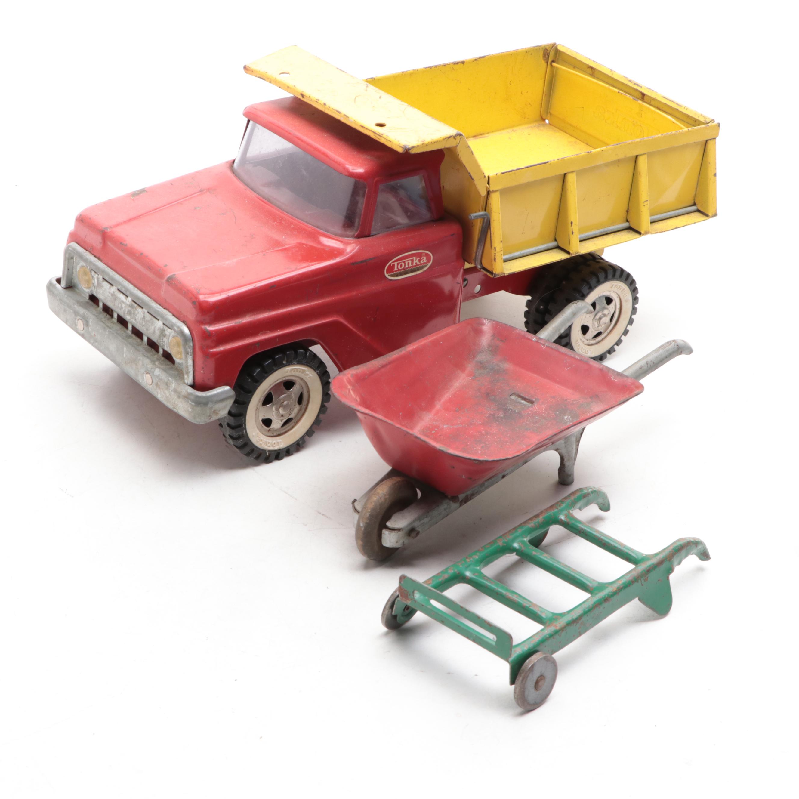 Tonka and Other Metal Toy Dump Trucks, Wheelbarrow and Dolly, Mid-20th Century