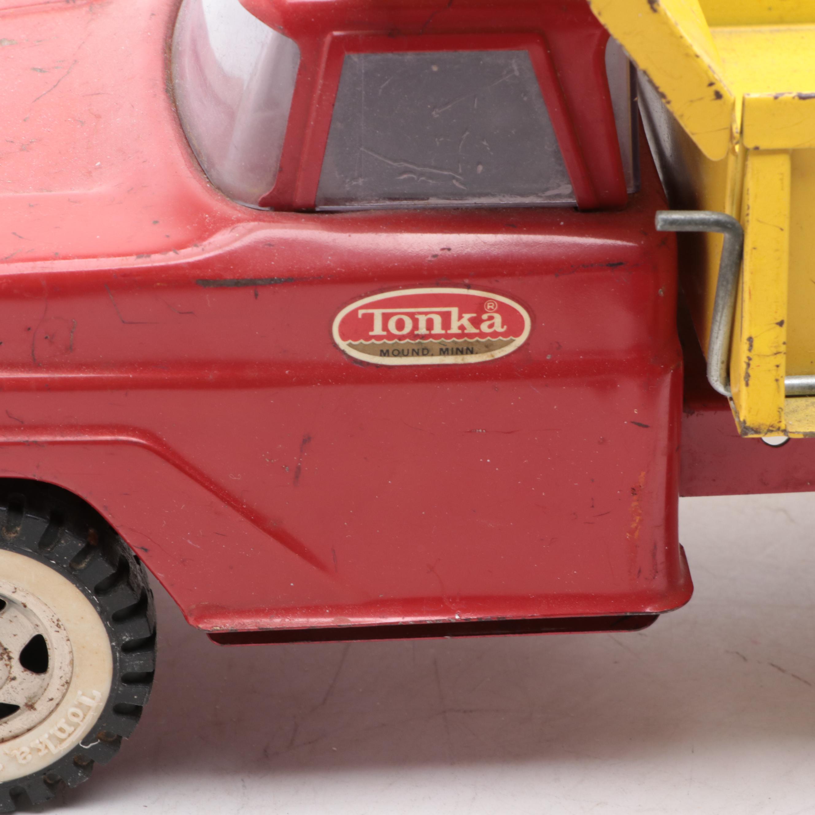 Tonka and Other Metal Toy Dump Trucks, Wheelbarrow and Dolly, Mid-20th Century