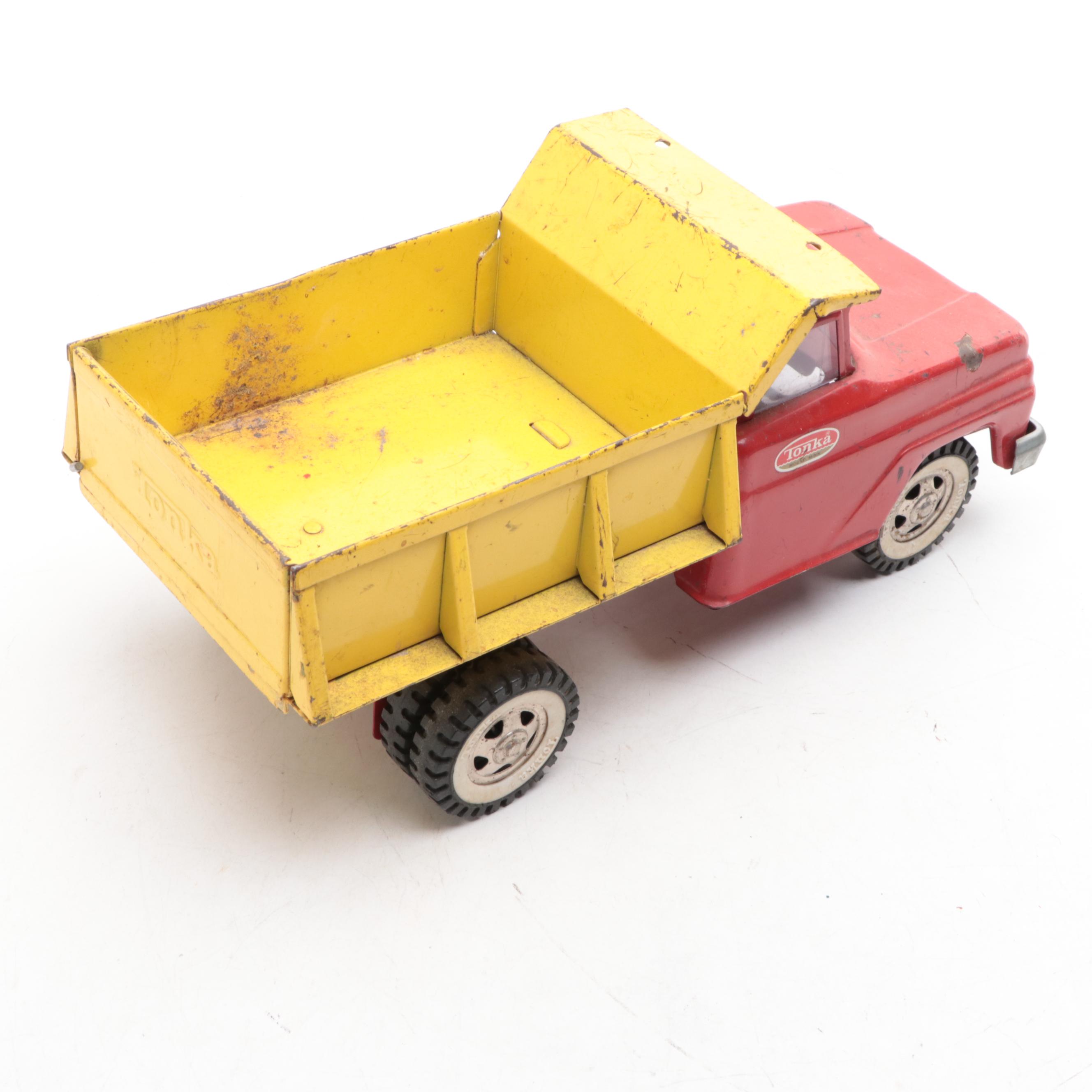 Tonka and Other Metal Toy Dump Trucks, Wheelbarrow and Dolly, Mid-20th Century