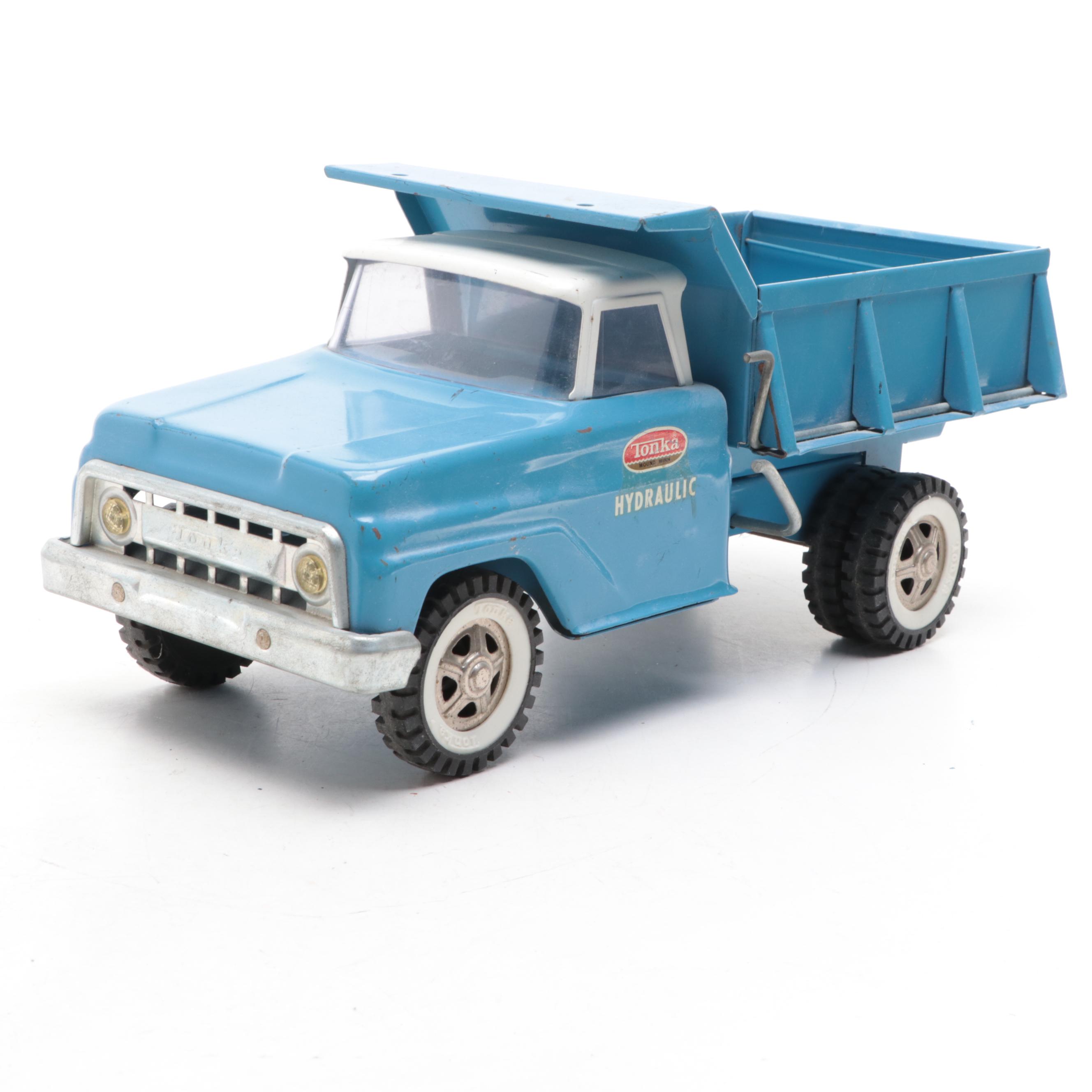 Tonka and Other Metal Toy Dump Trucks, Wheelbarrow and Dolly, Mid-20th Century
