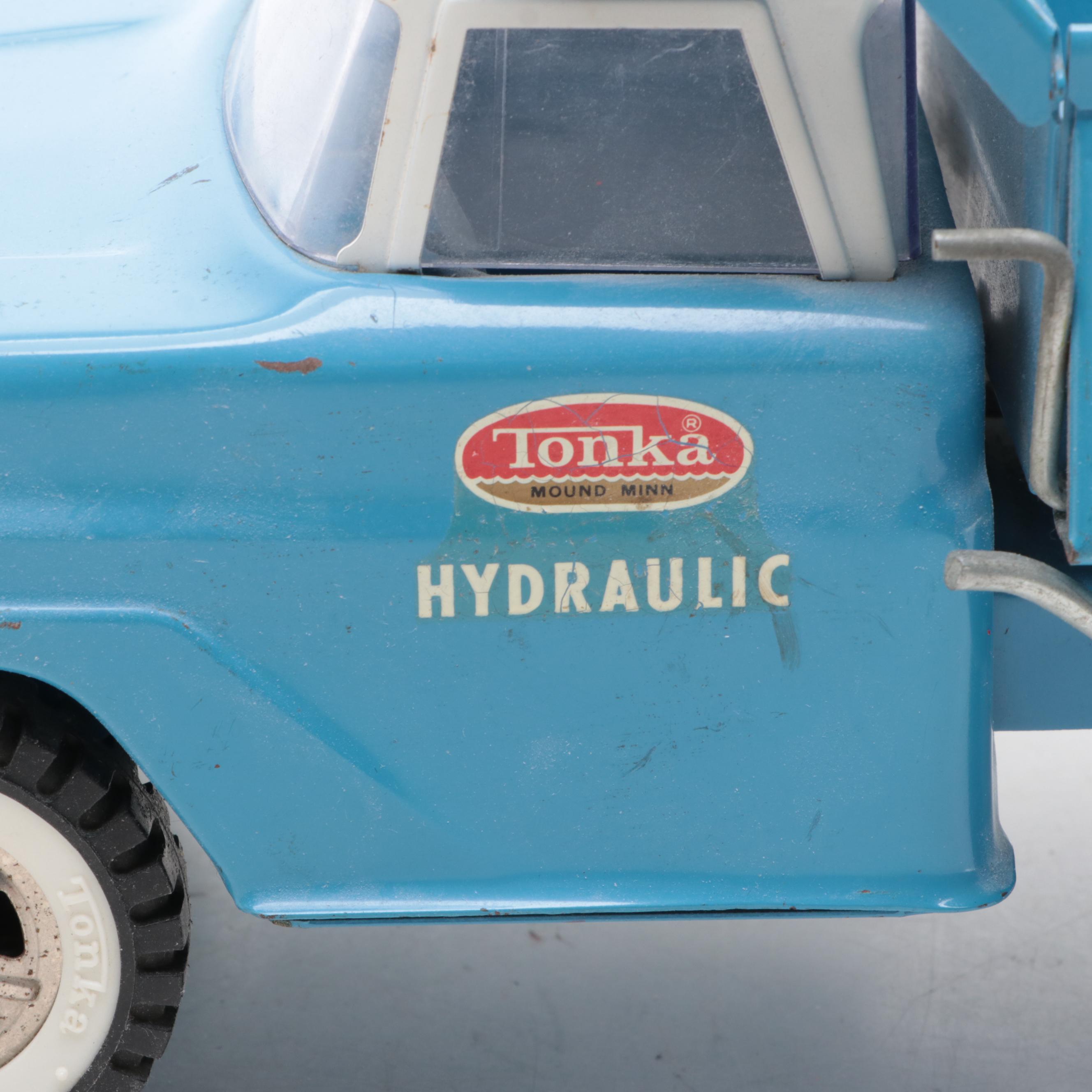 Tonka and Other Metal Toy Dump Trucks, Wheelbarrow and Dolly, Mid-20th Century