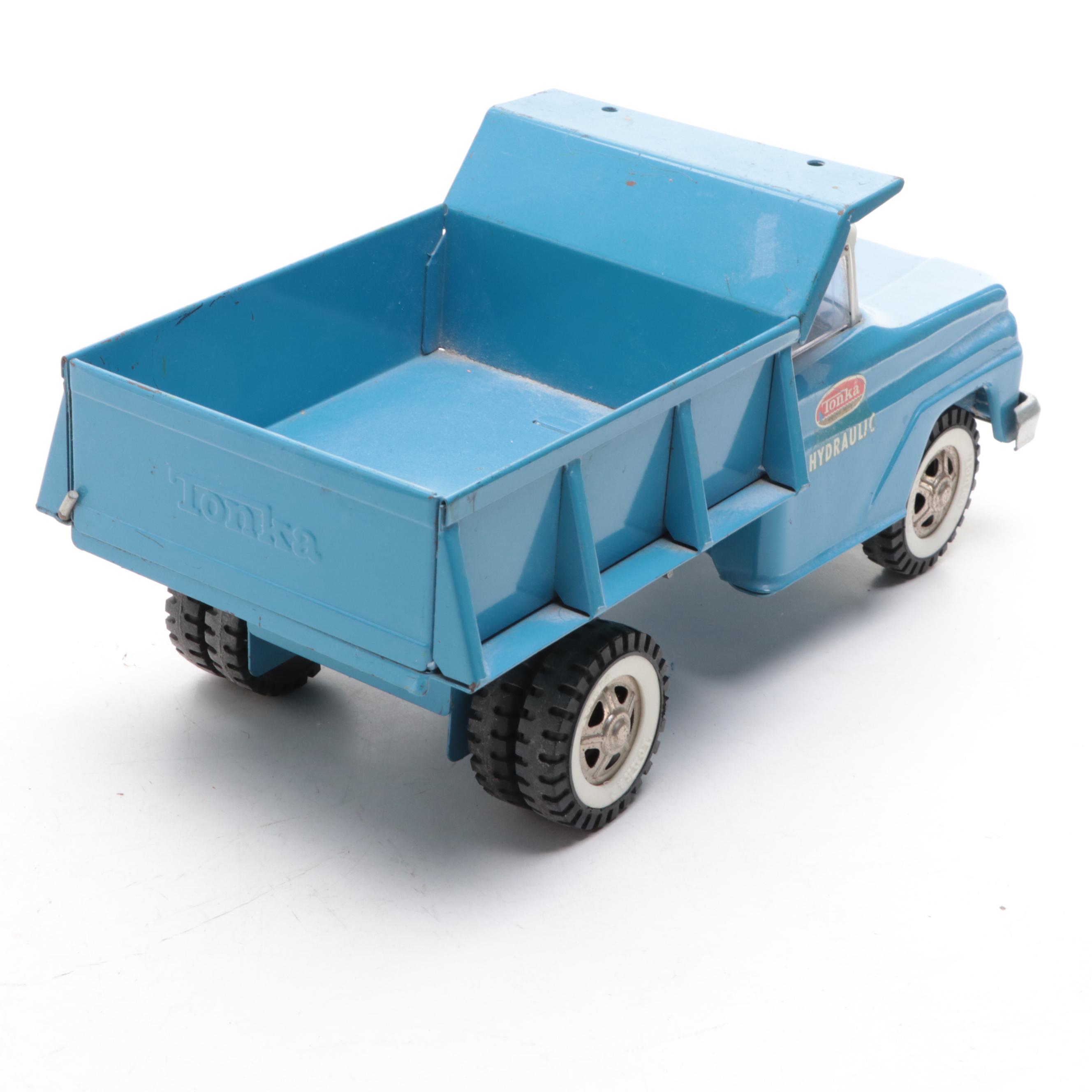 Tonka and Other Metal Toy Dump Trucks, Wheelbarrow and Dolly, Mid-20th Century