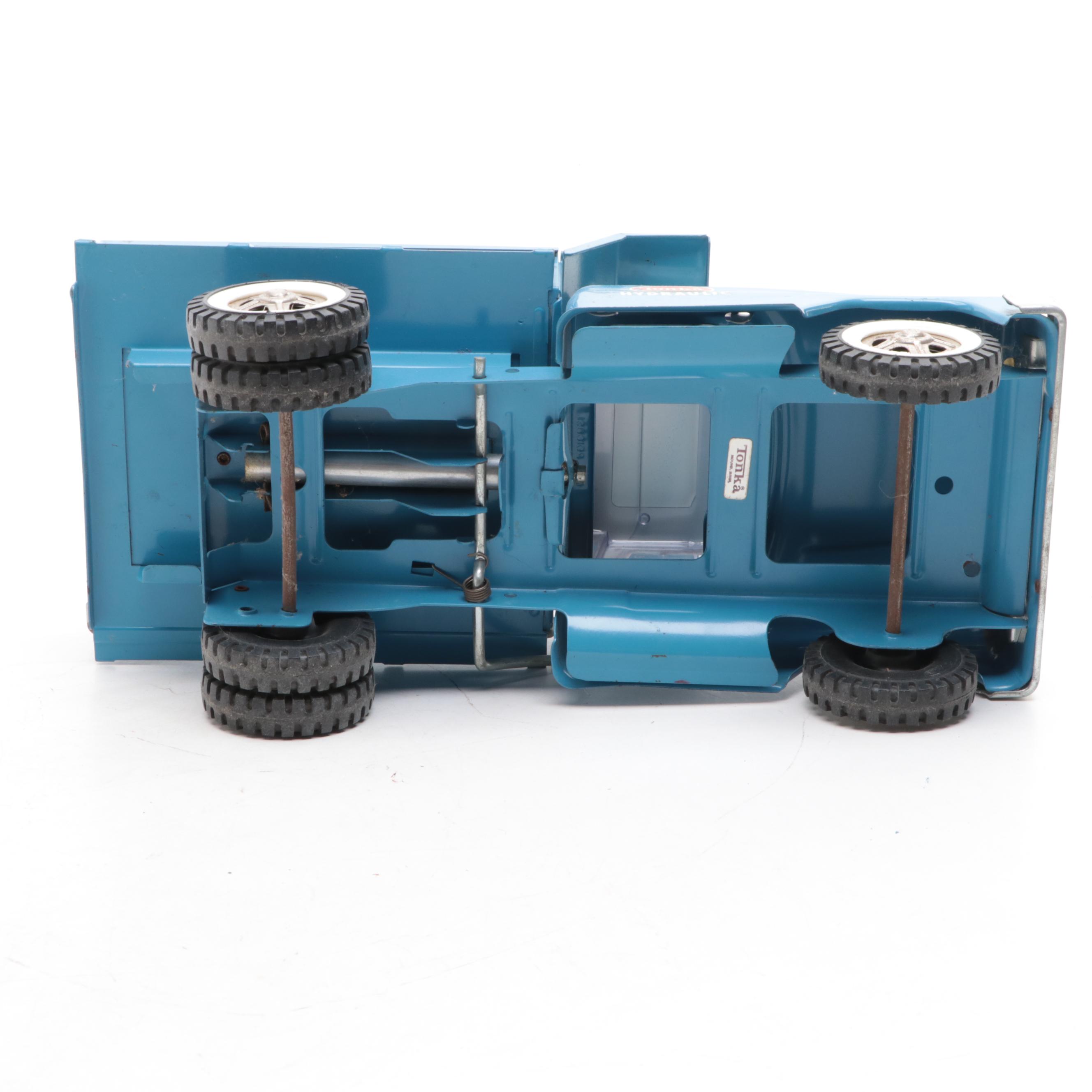 Tonka and Other Metal Toy Dump Trucks, Wheelbarrow and Dolly, Mid-20th Century