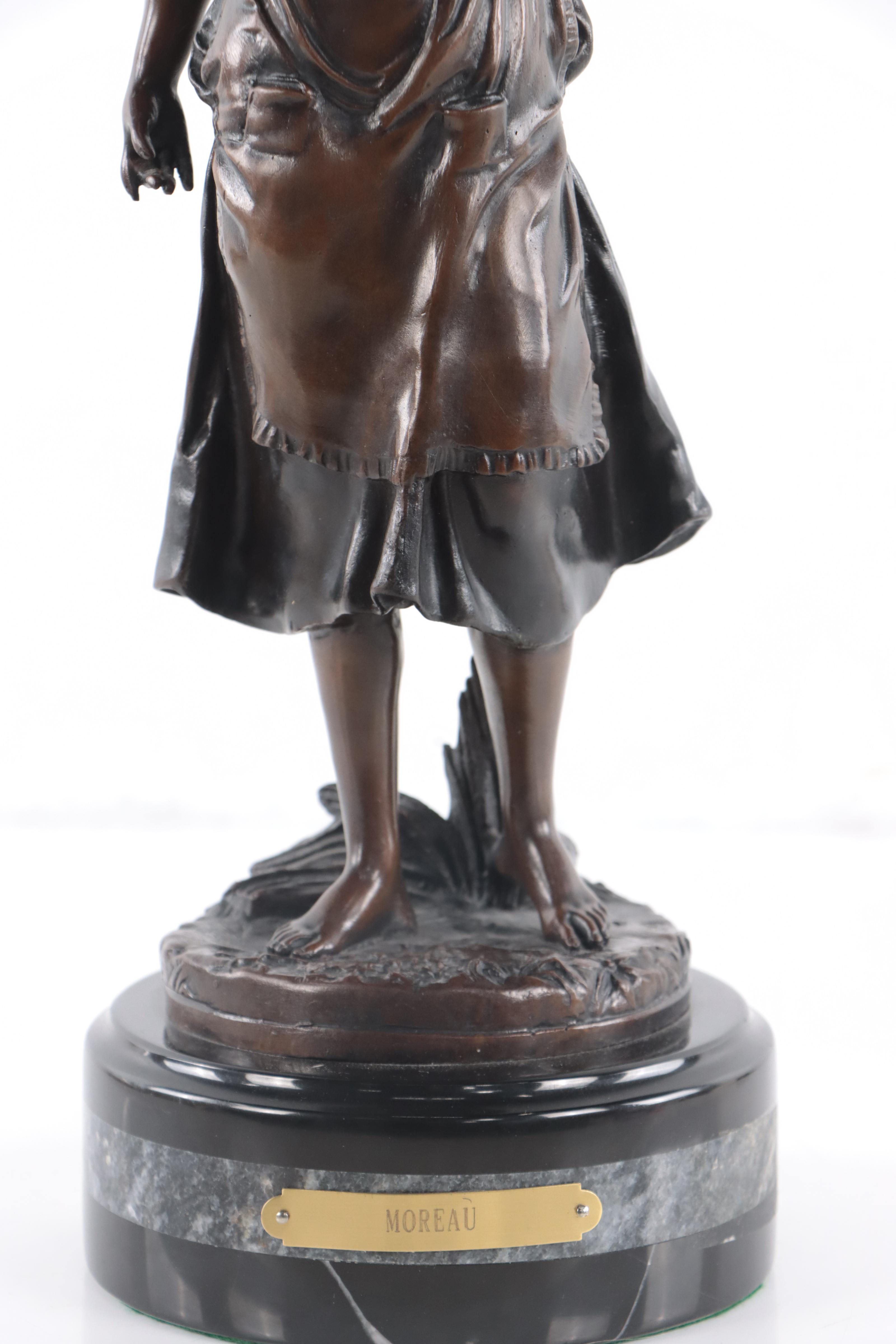 Bronze Sculpture of Woman Holding Flowers