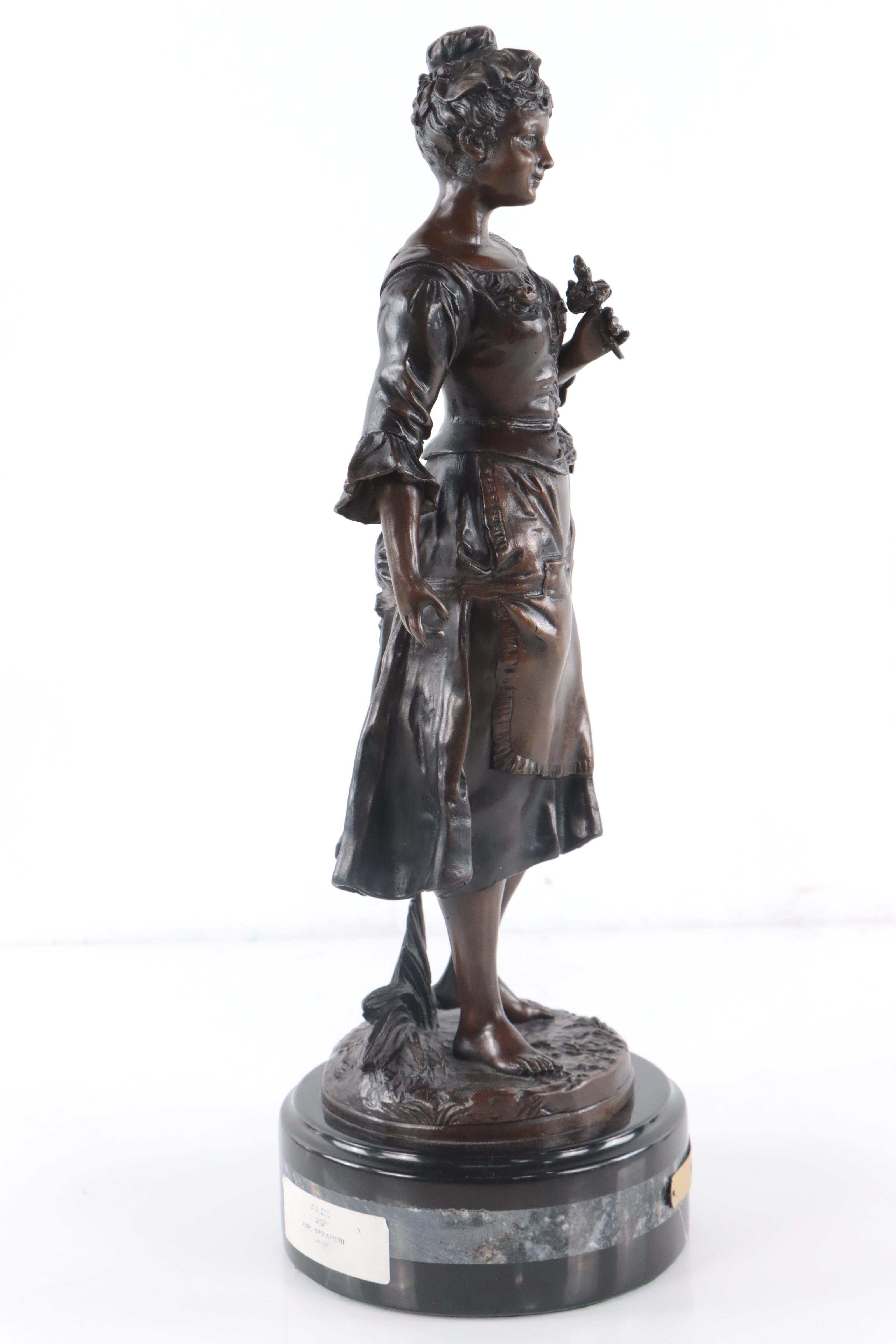 Bronze Sculpture of Woman Holding Flowers