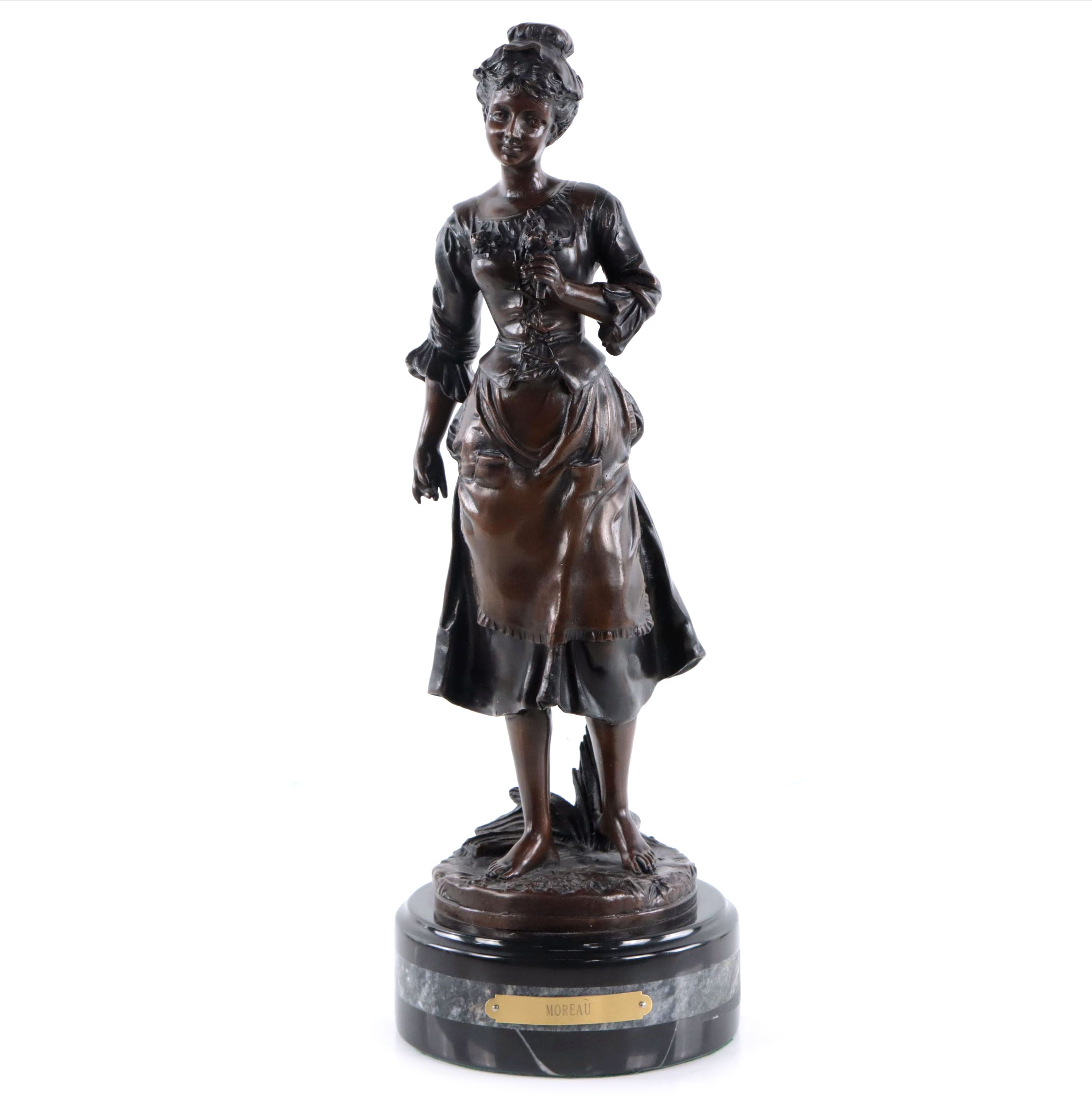 Bronze Sculpture of Woman Holding Flowers