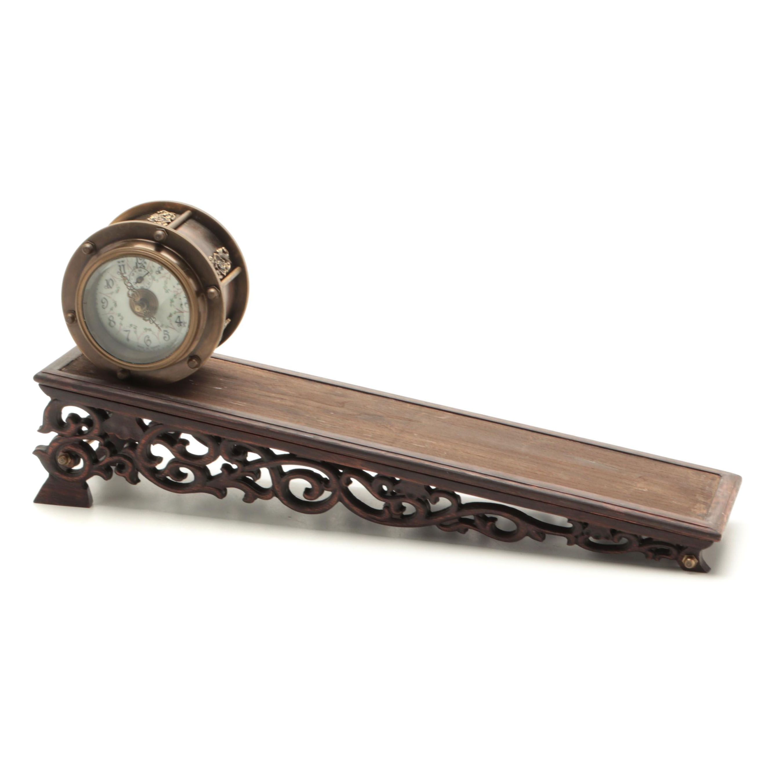 French Porcelain and Brass Incline Plane Rolling Clock with Stand