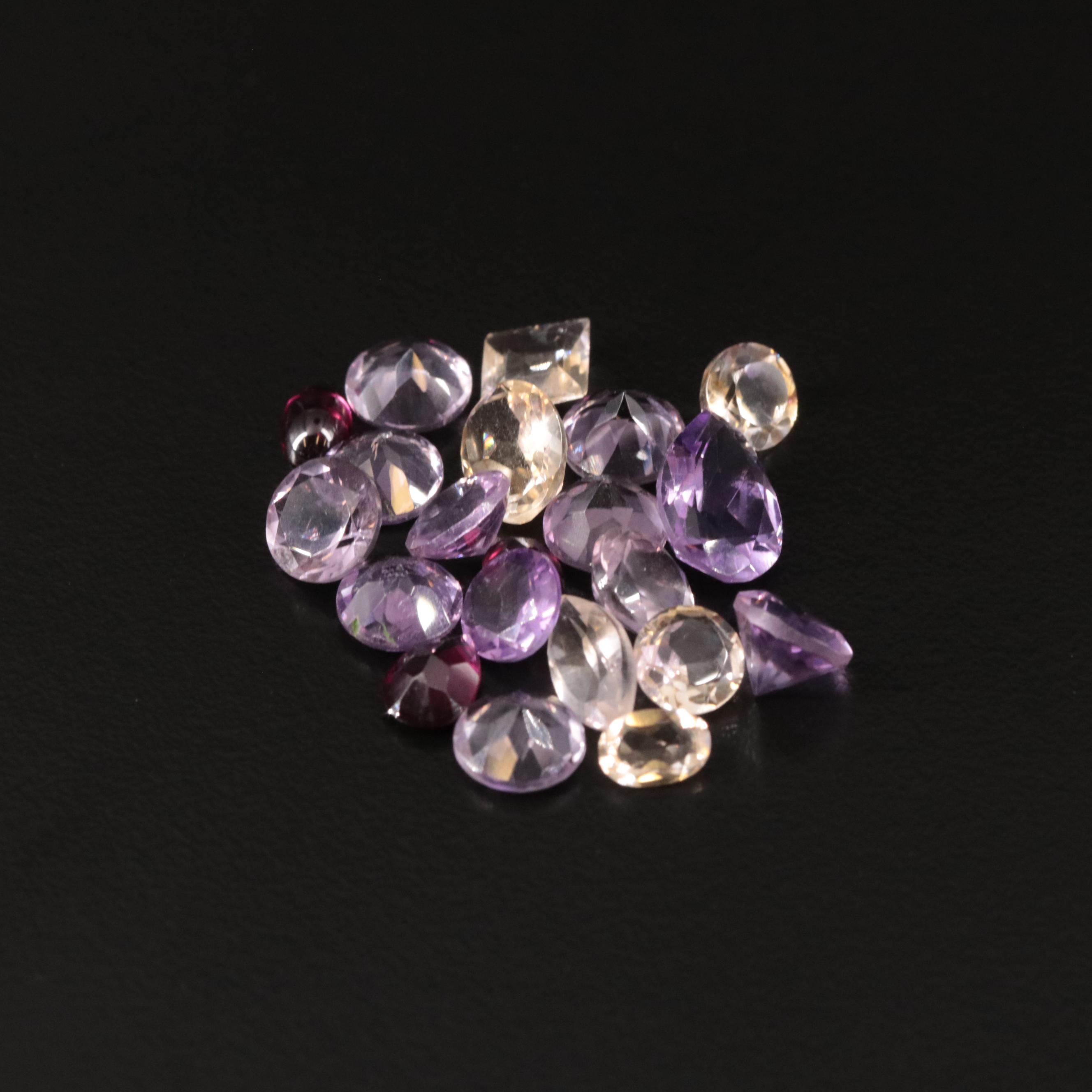 Loose 21.71 CTW Amethyst, Citrine, and Garnet Lot