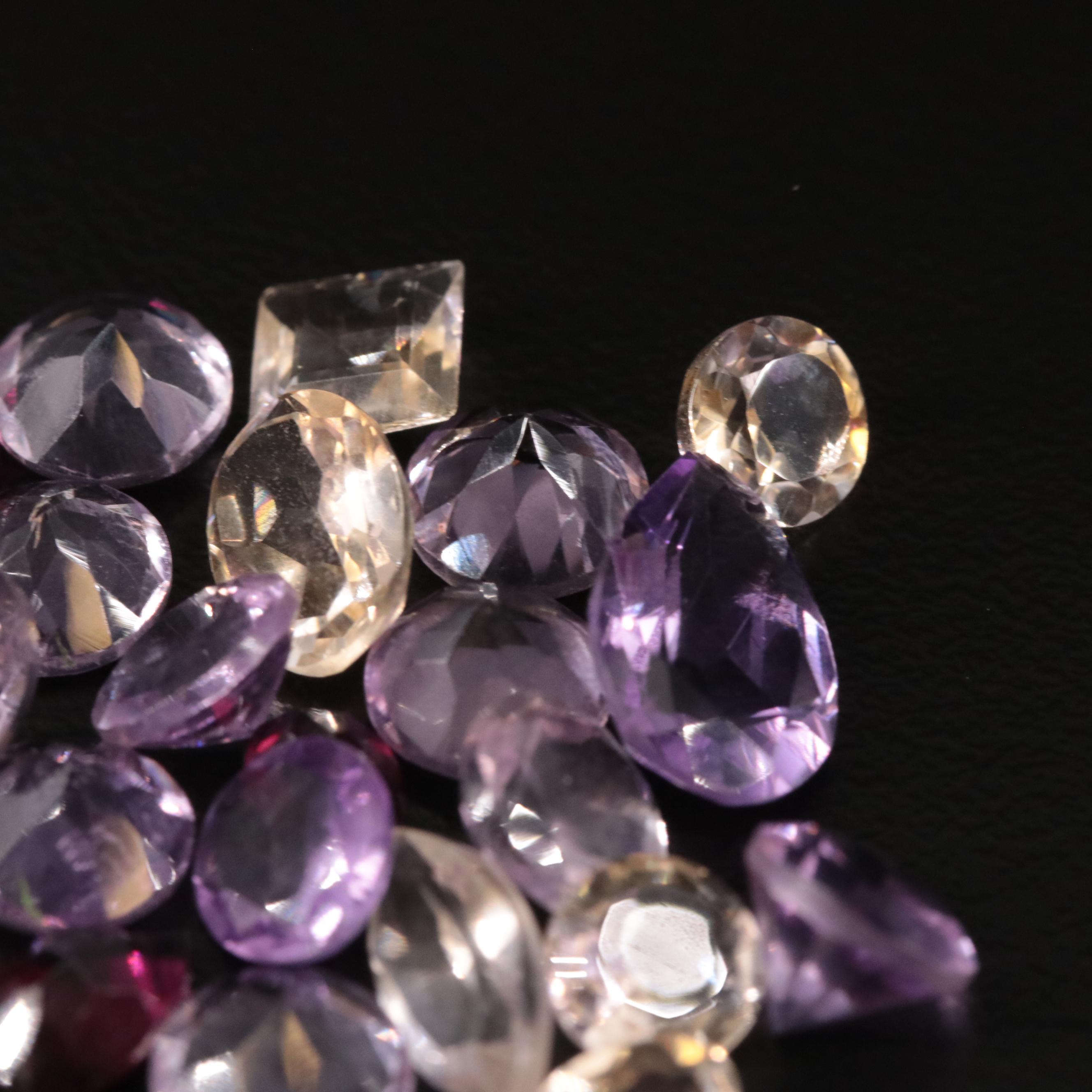 Loose 21.71 CTW Amethyst, Citrine, and Garnet Lot