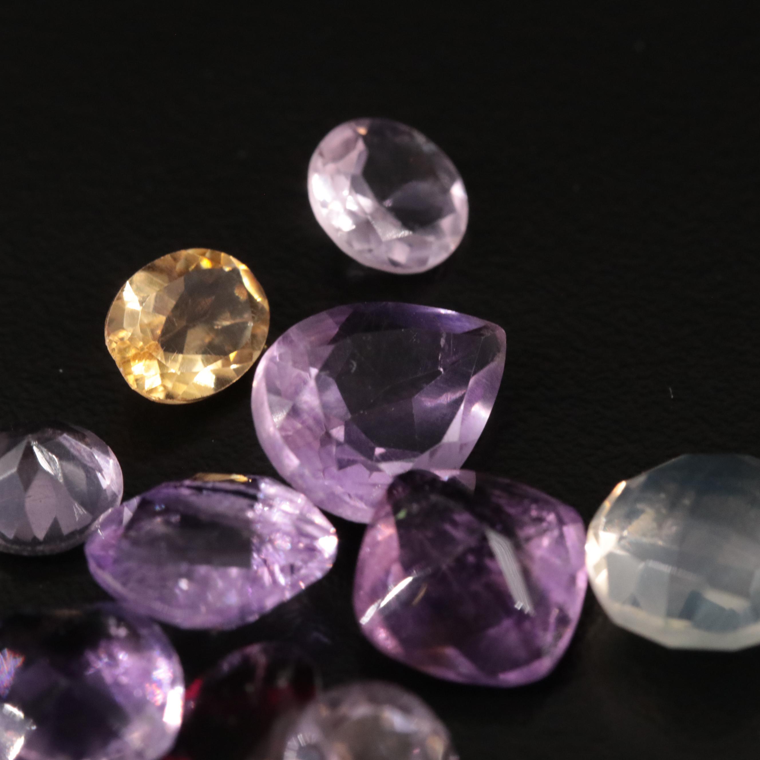 Loose 20.97 CTW Amethyst, Citrine, and Garnet Lot