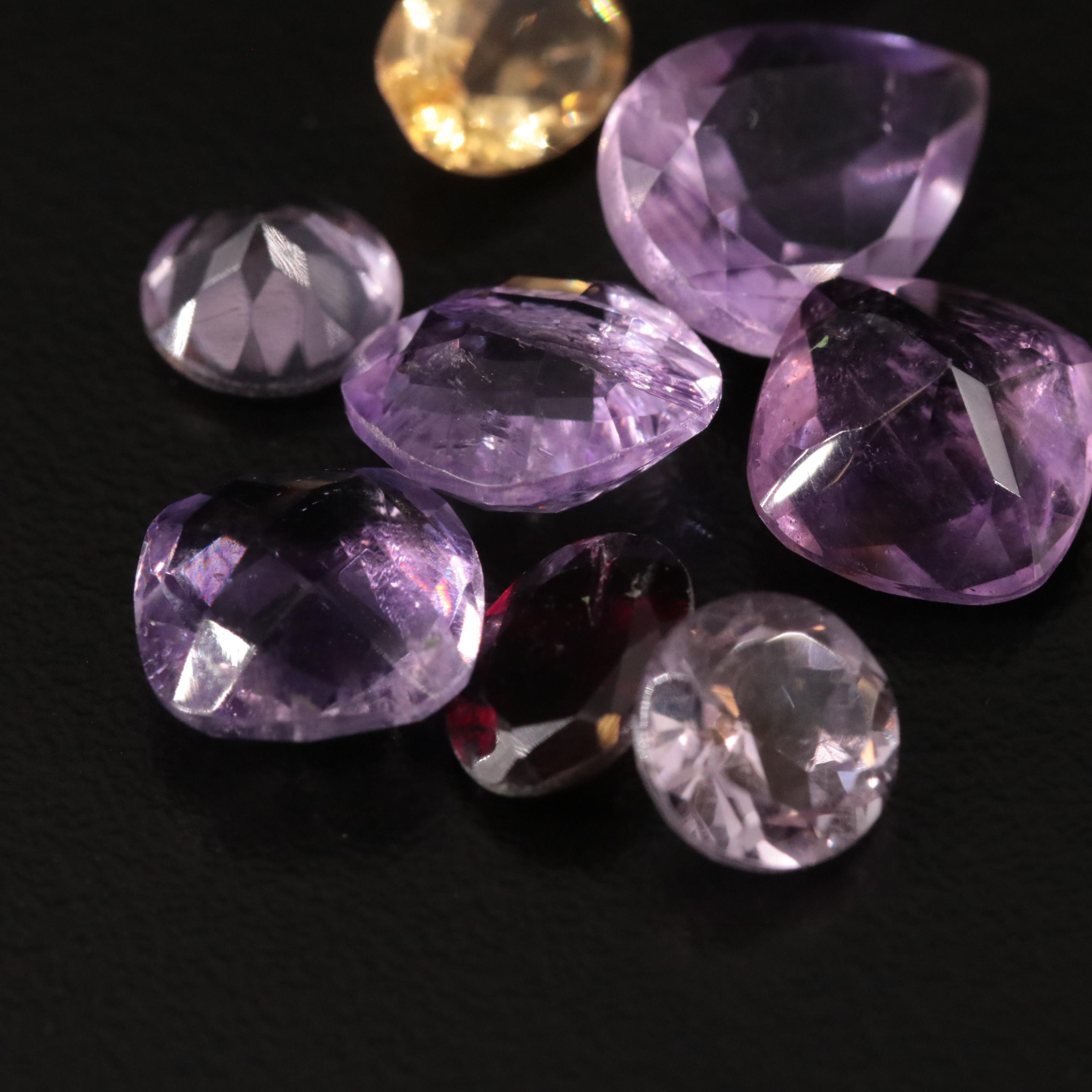 Loose 20.97 CTW Amethyst, Citrine, and Garnet Lot