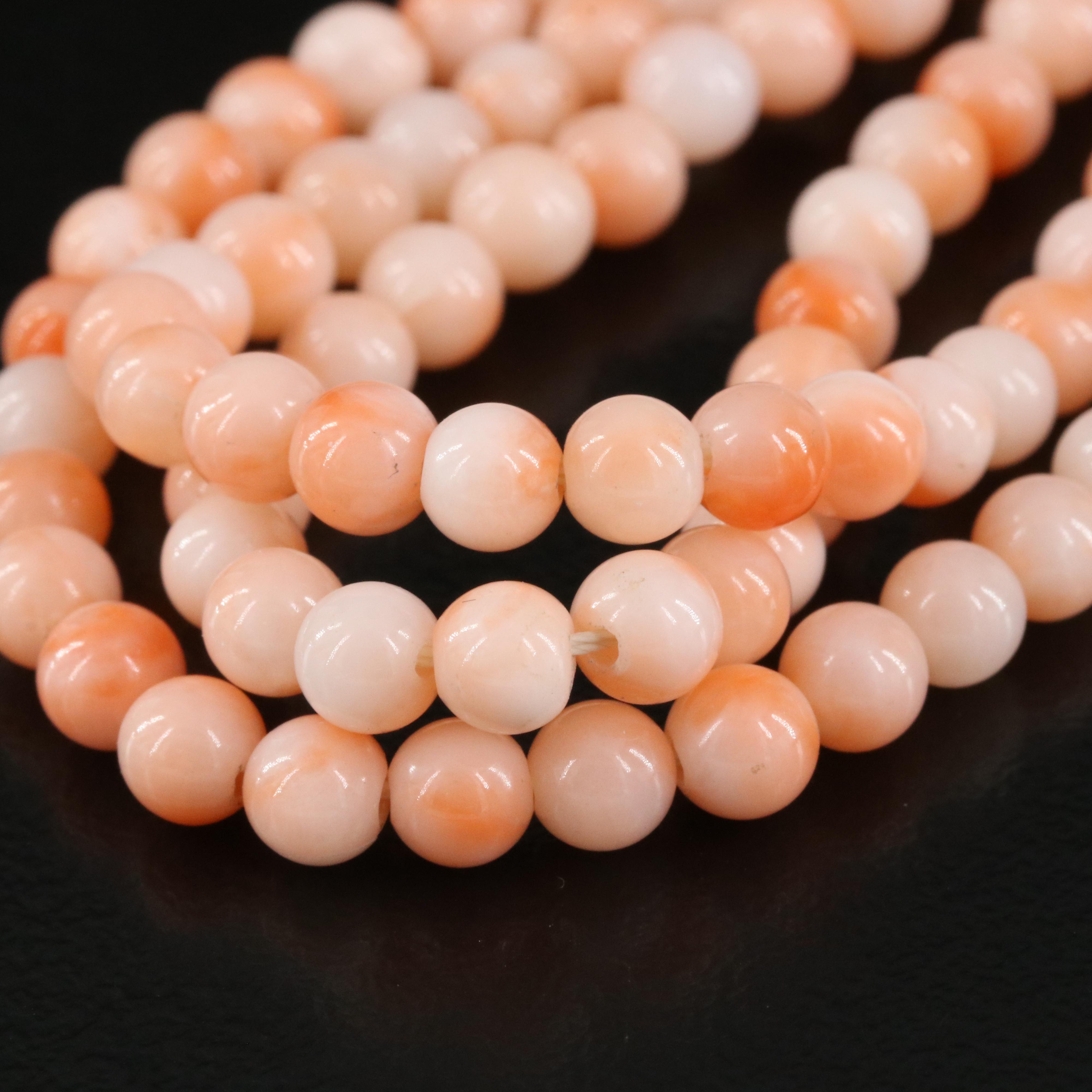 Coral Torsade with 14K Clasp