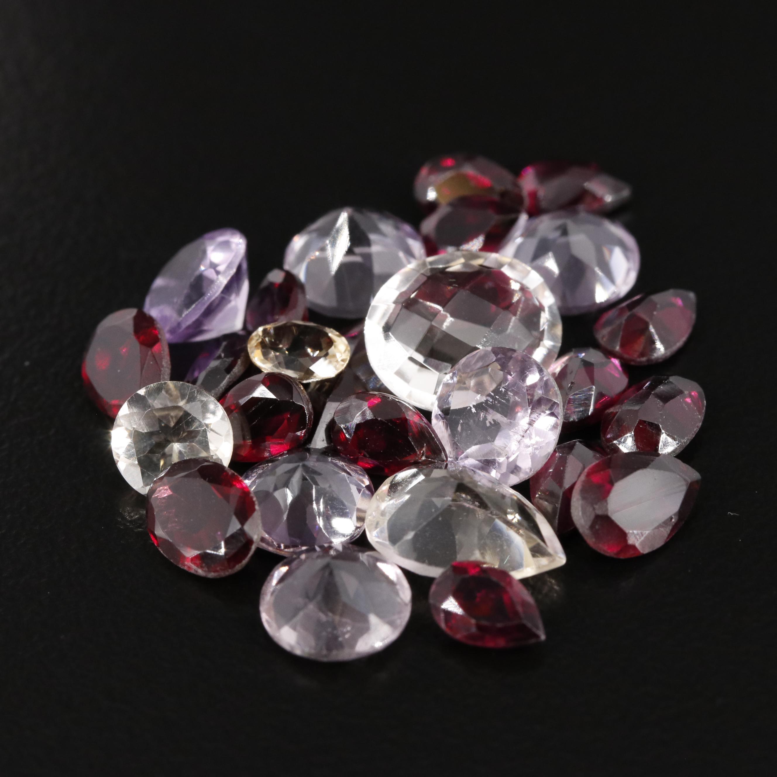 Loose 23.40 CTW Amethyst, Garnet and Citrine Lot
