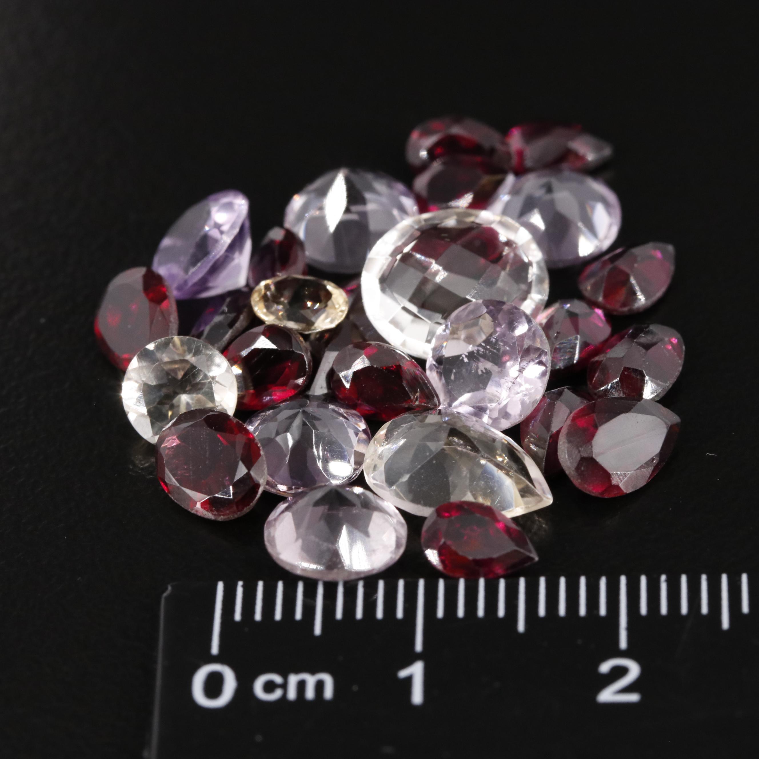 Loose 23.40 CTW Amethyst, Garnet and Citrine Lot