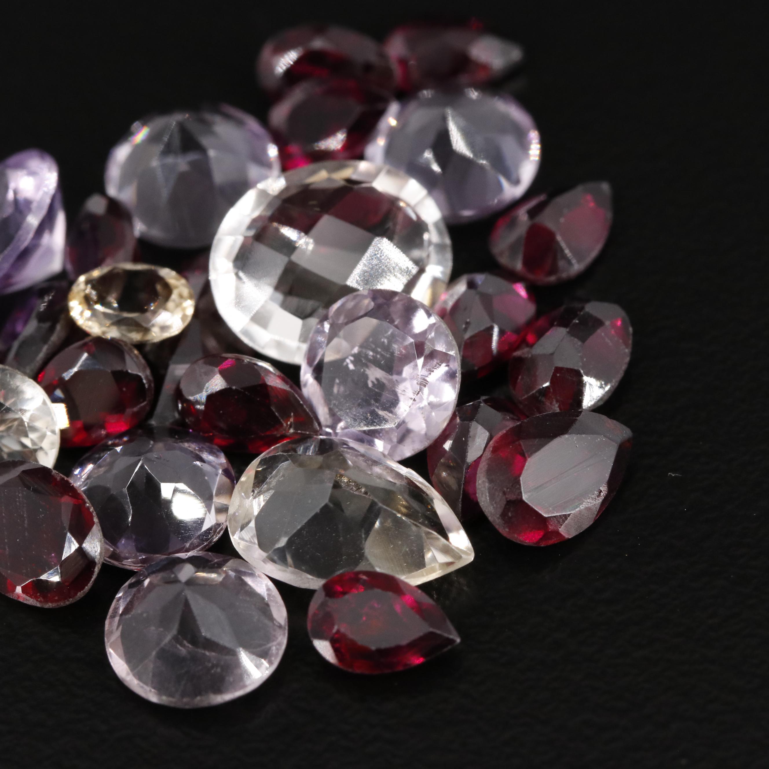 Loose 23.40 CTW Amethyst, Garnet and Citrine Lot