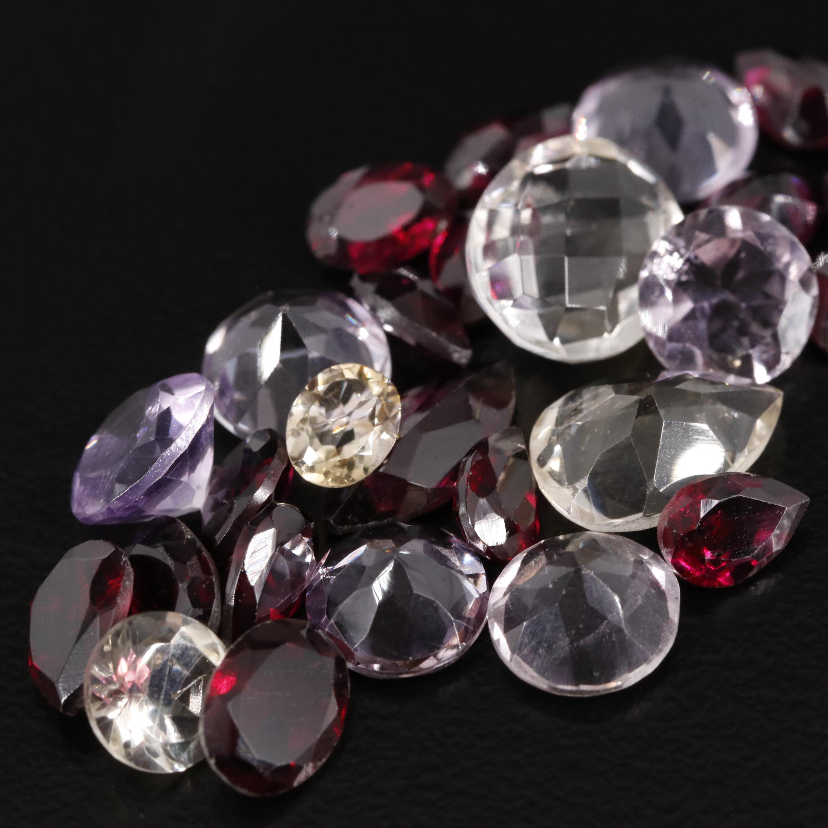 Loose 23.40 CTW Amethyst, Garnet and Citrine Lot