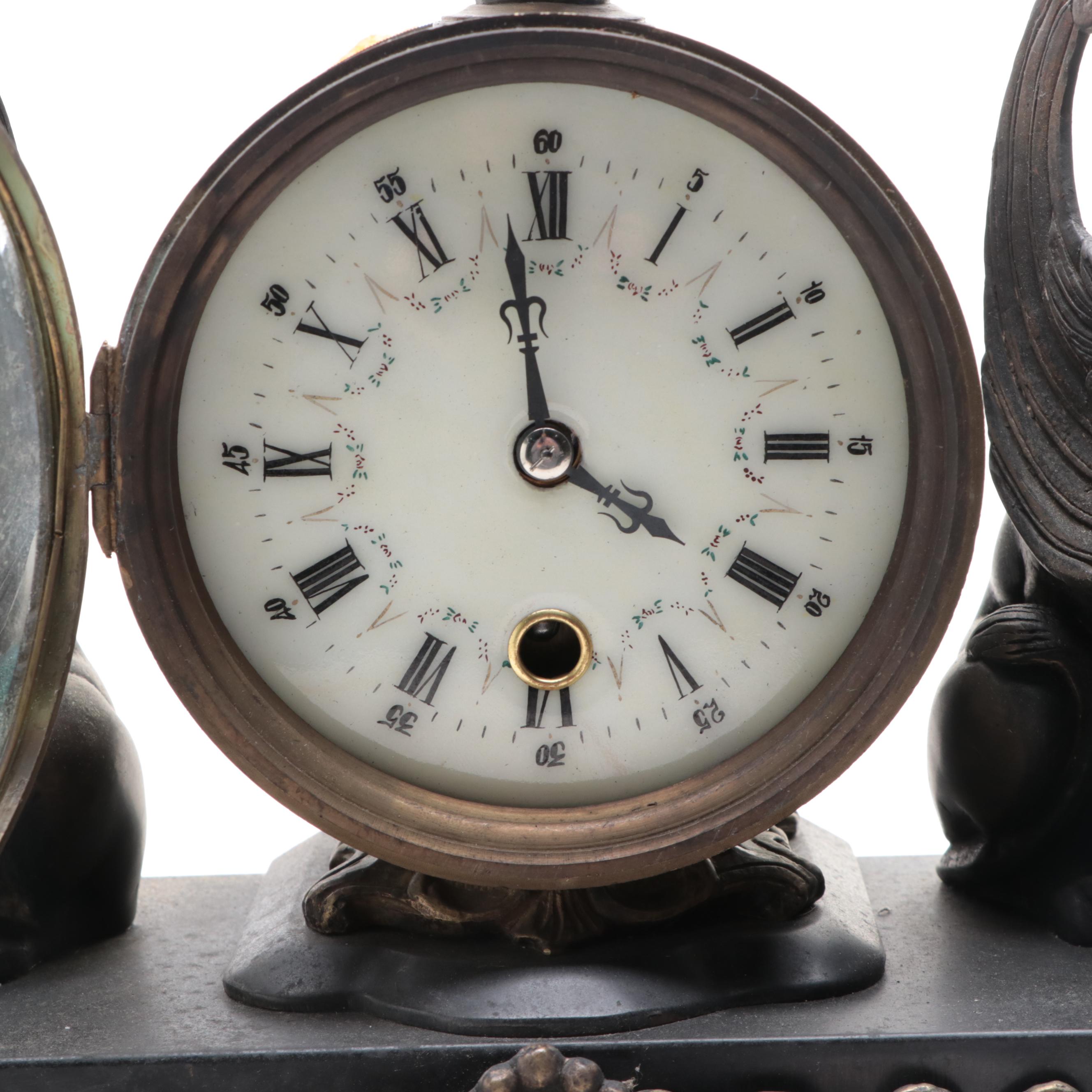Rococo Style Metal and Porcelain Mantel Clock with Griffins