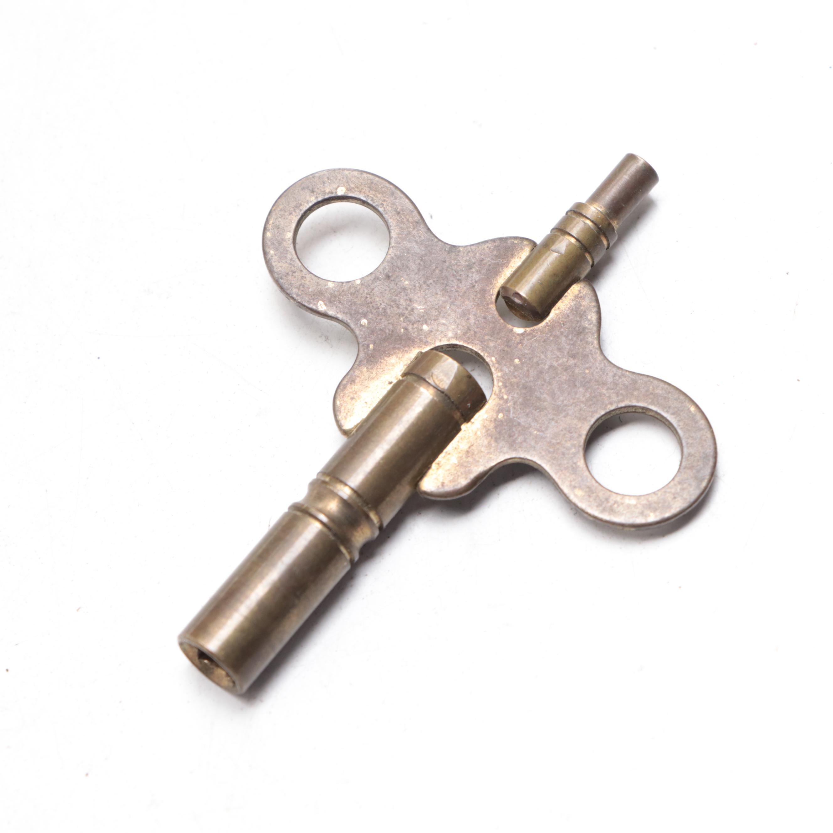 Rococo Style Metal and Porcelain Mantel Clock with Griffins