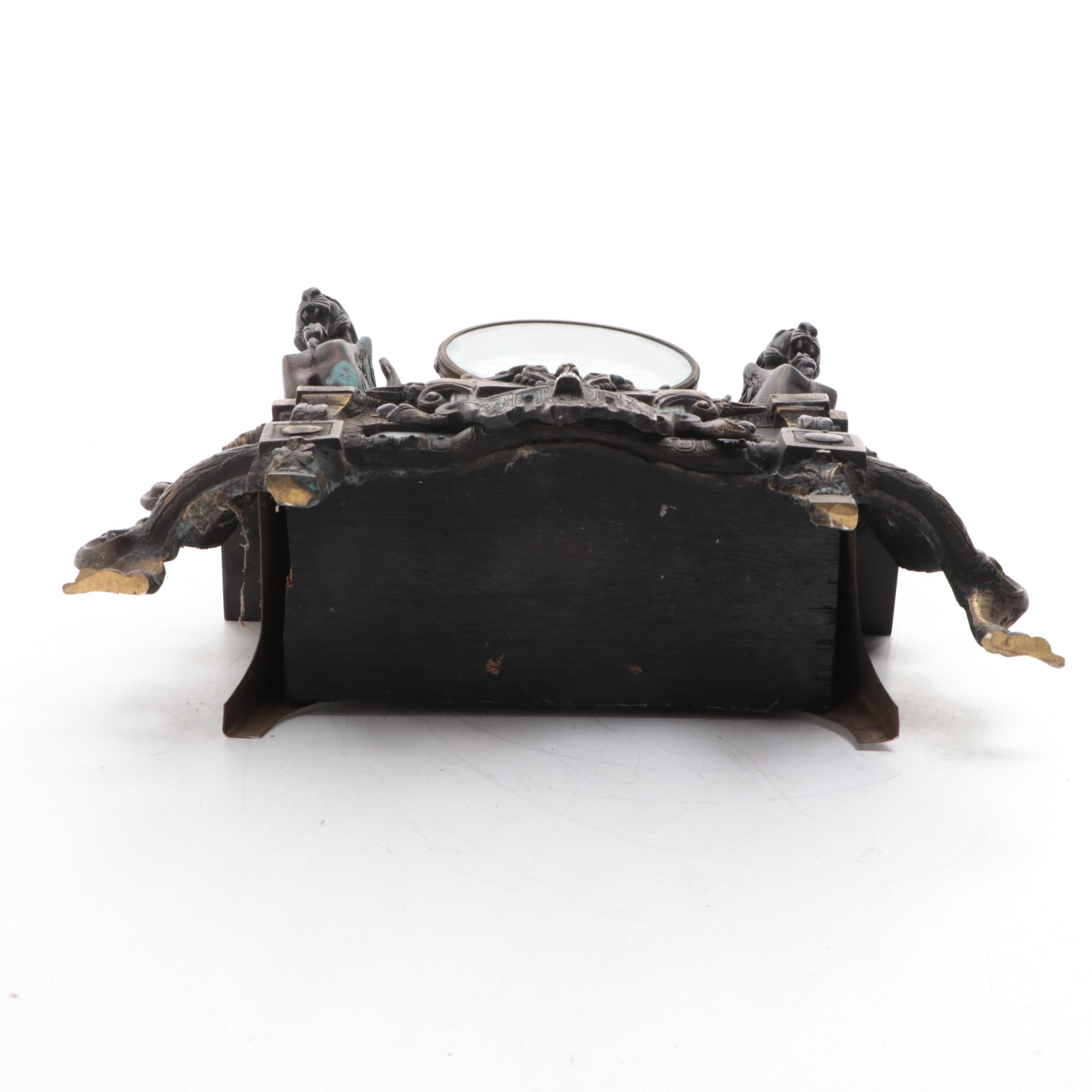 Rococo Style Metal and Porcelain Mantel Clock with Griffins