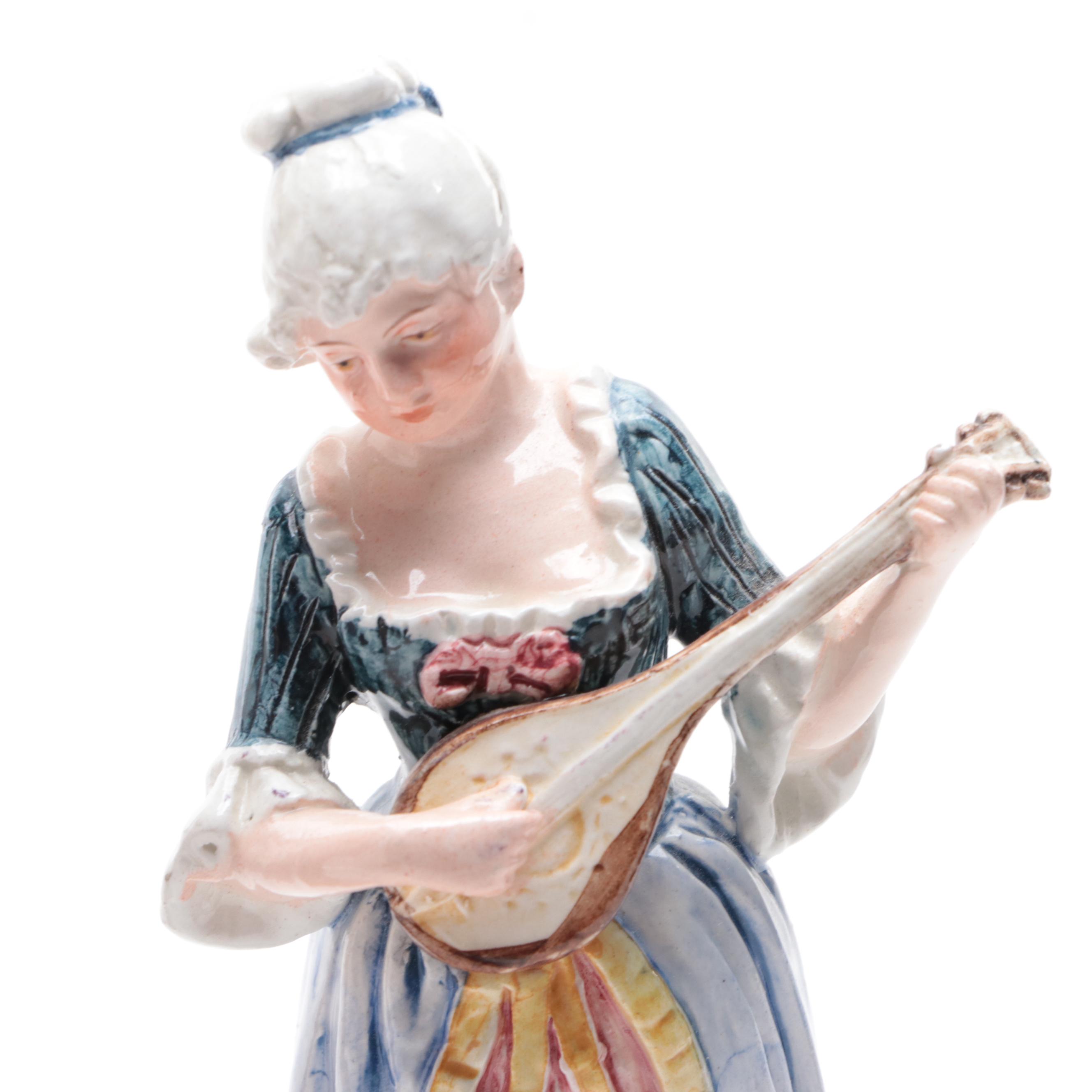 Pair of Continental European Ceramic Musician Figurines
