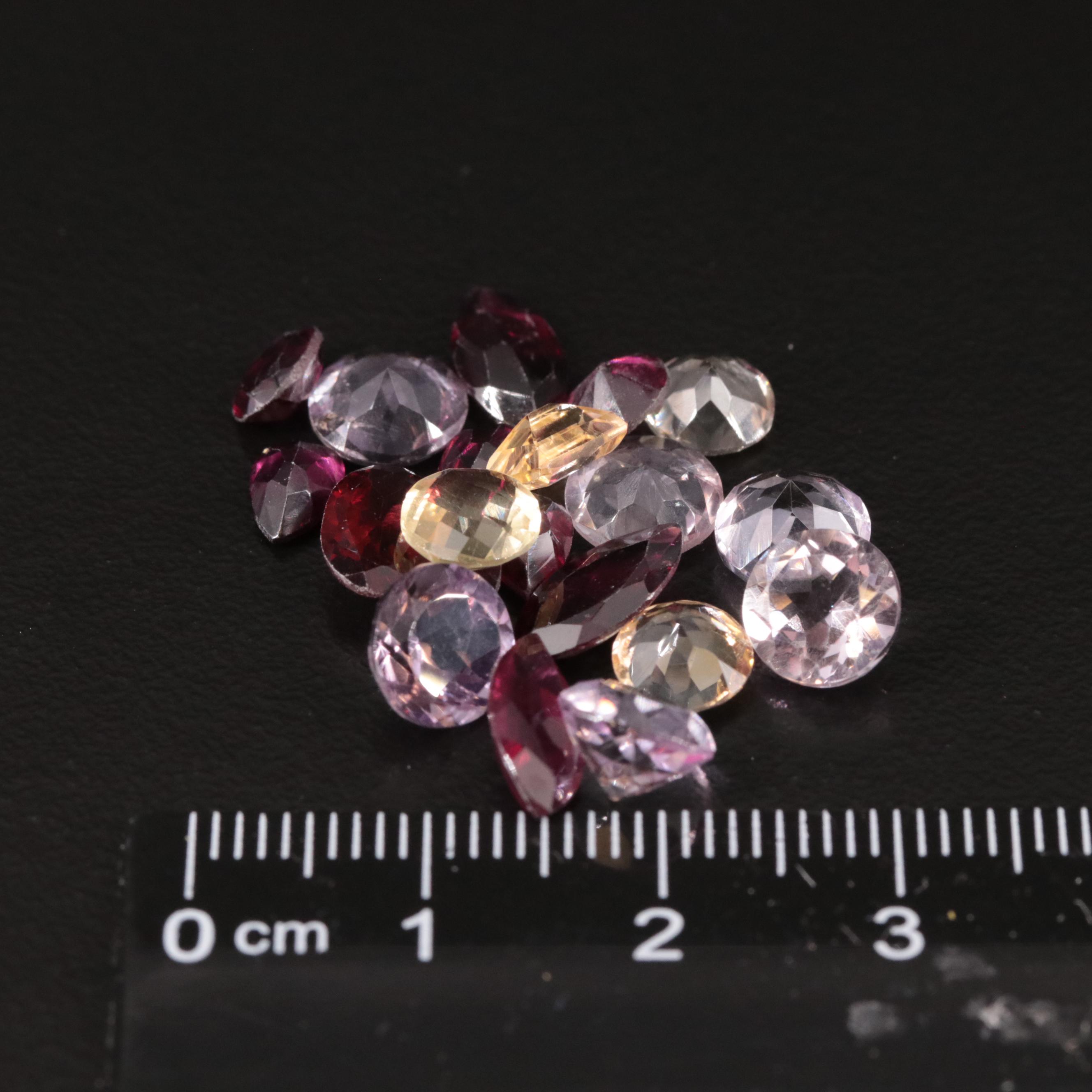 Loose 17.4 CTW Amethyst, Citrine, and Garnet Lot