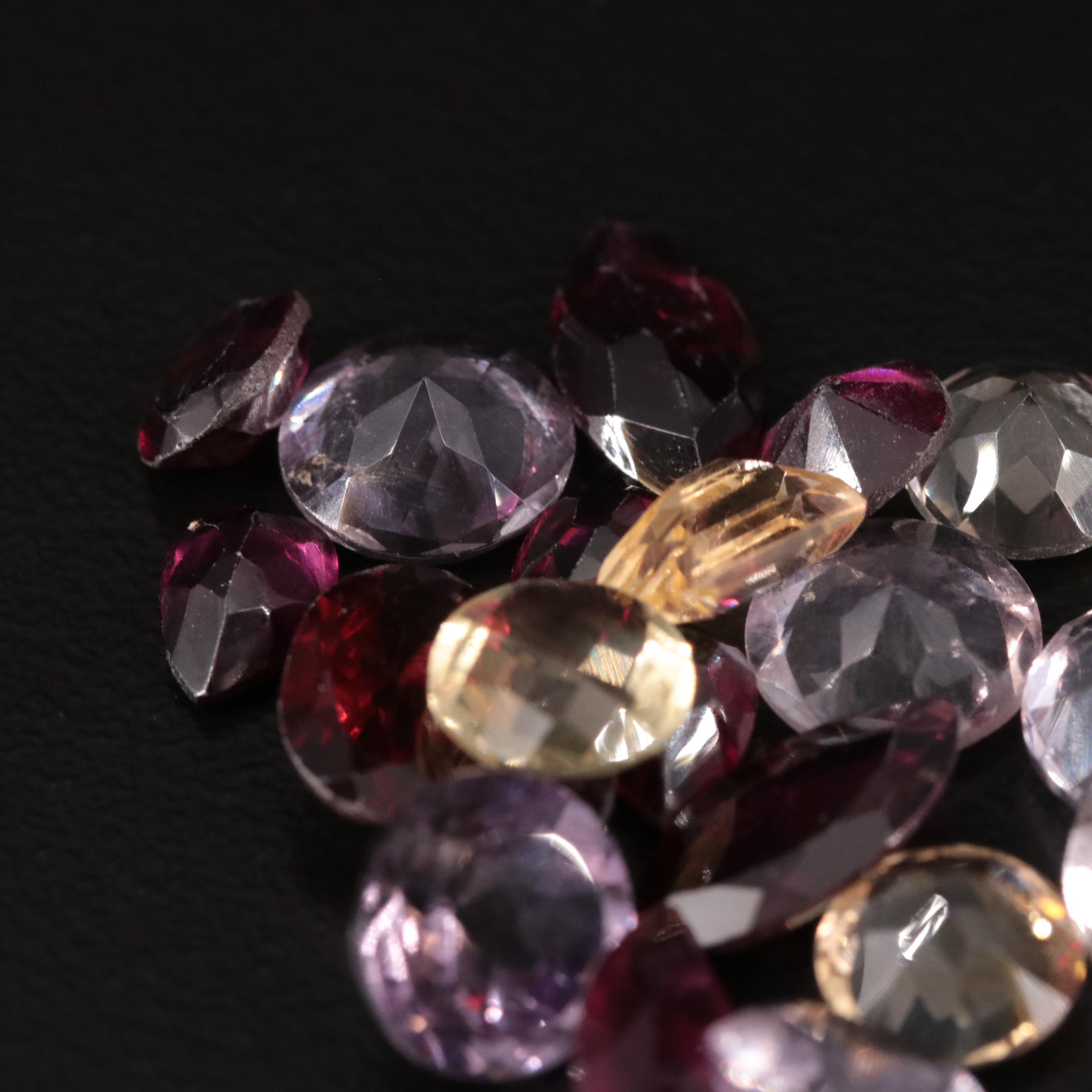 Loose 17.4 CTW Amethyst, Citrine, and Garnet Lot