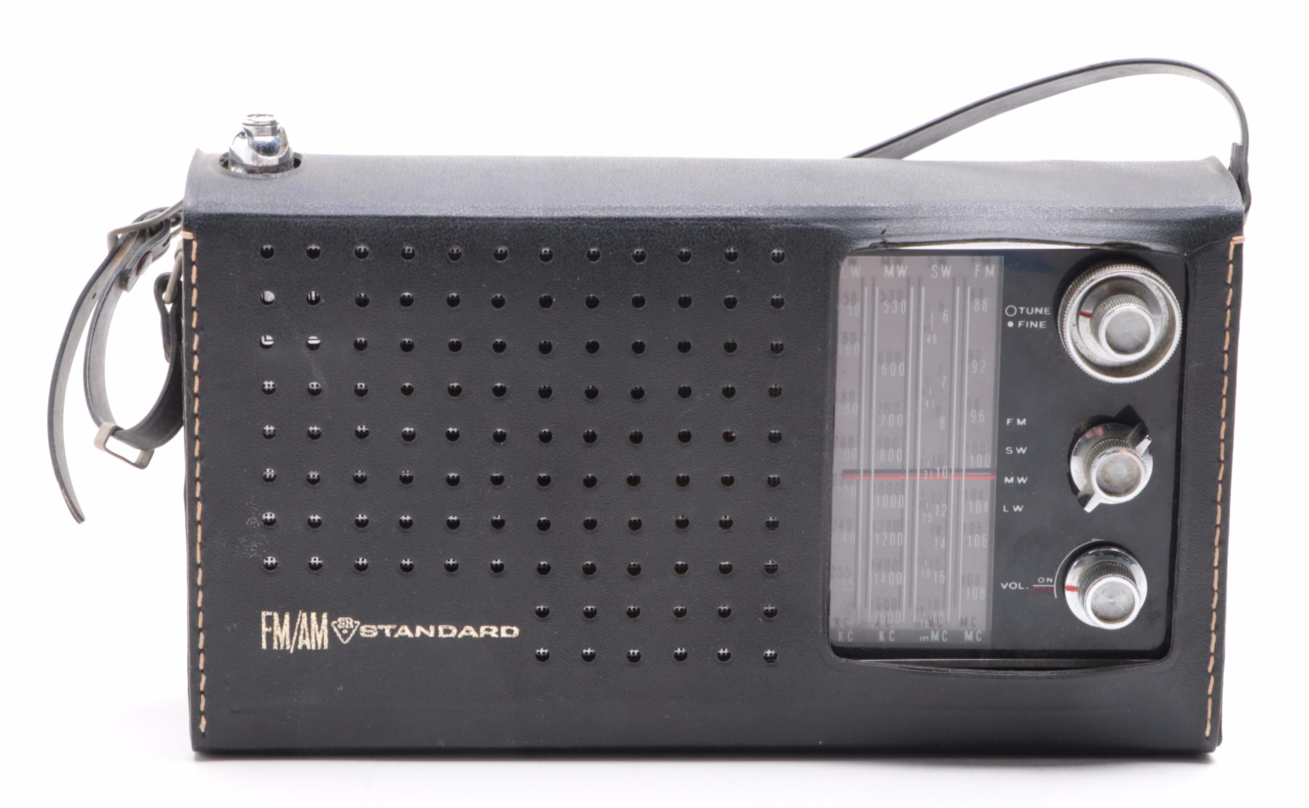 Standard Transistor Radio and Sony Walkman Cassette Player