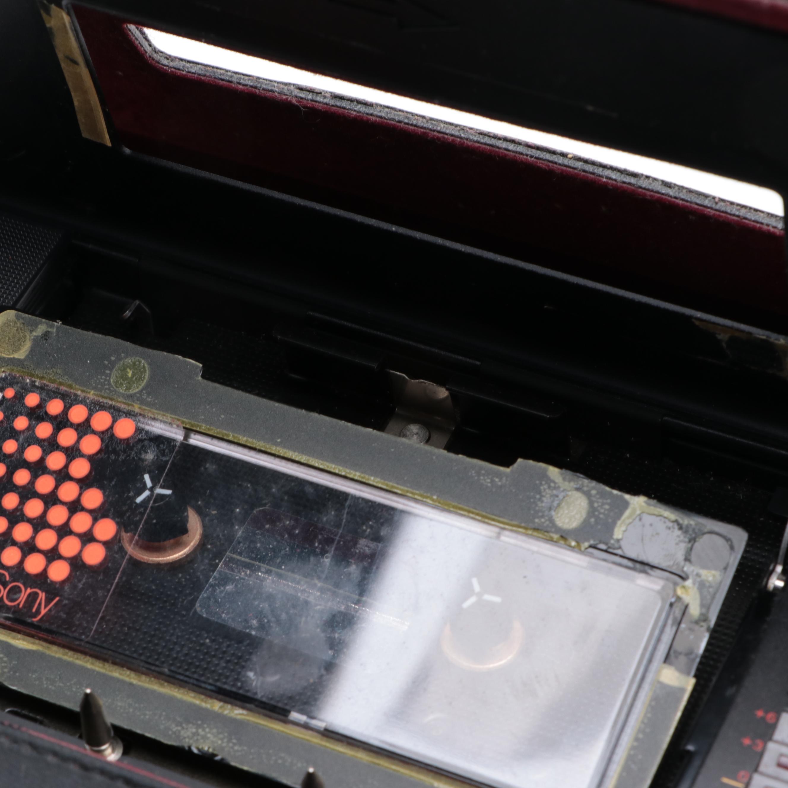 Standard Transistor Radio and Sony Walkman Cassette Player