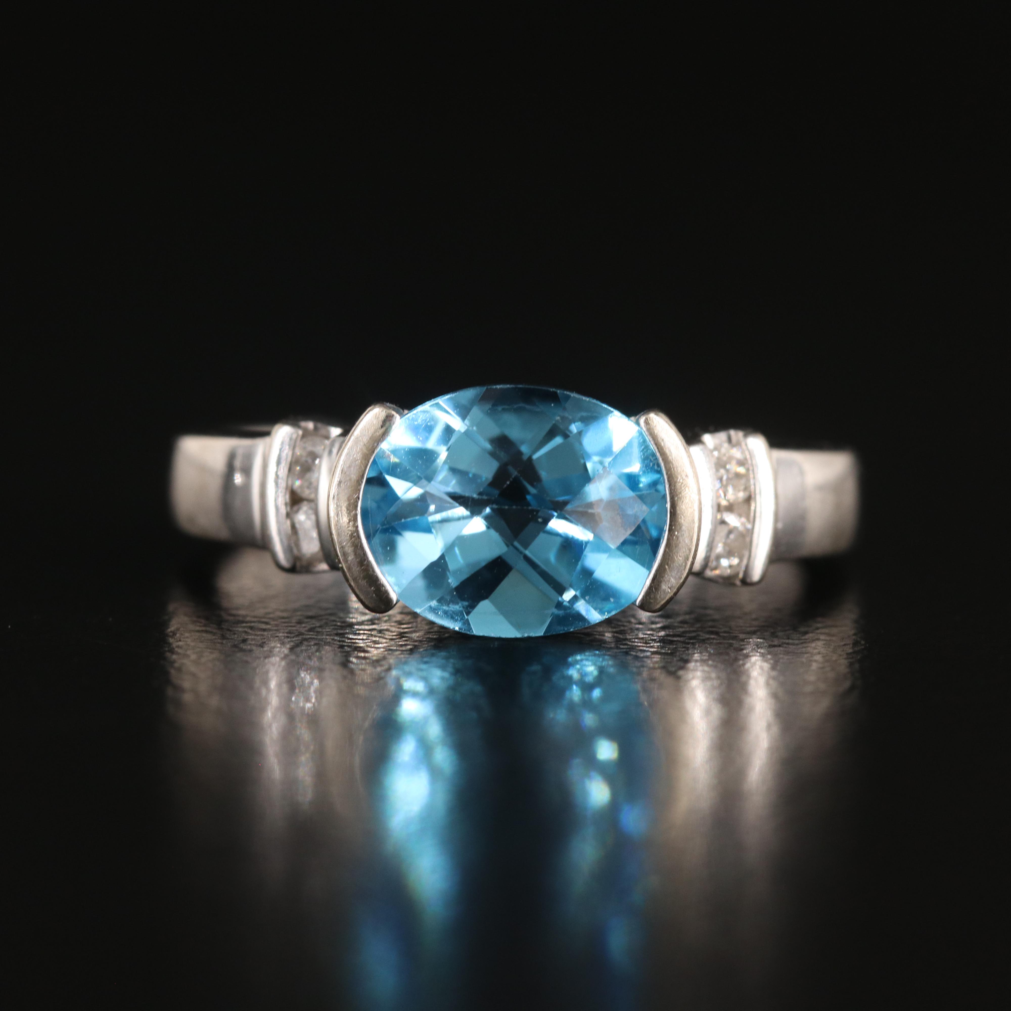 14K Swiss Blue Topaz and Diamond Ring