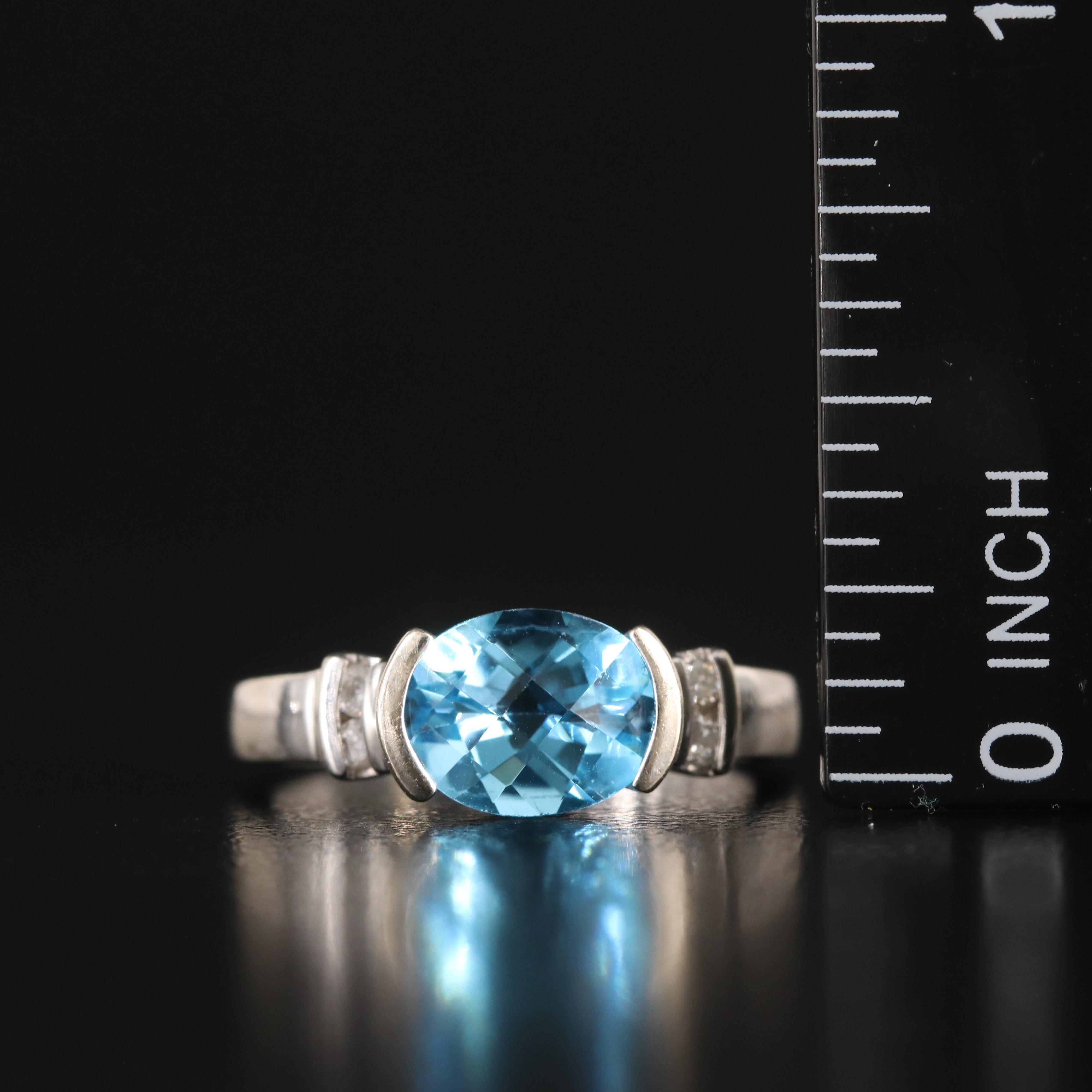 14K Swiss Blue Topaz and Diamond Ring