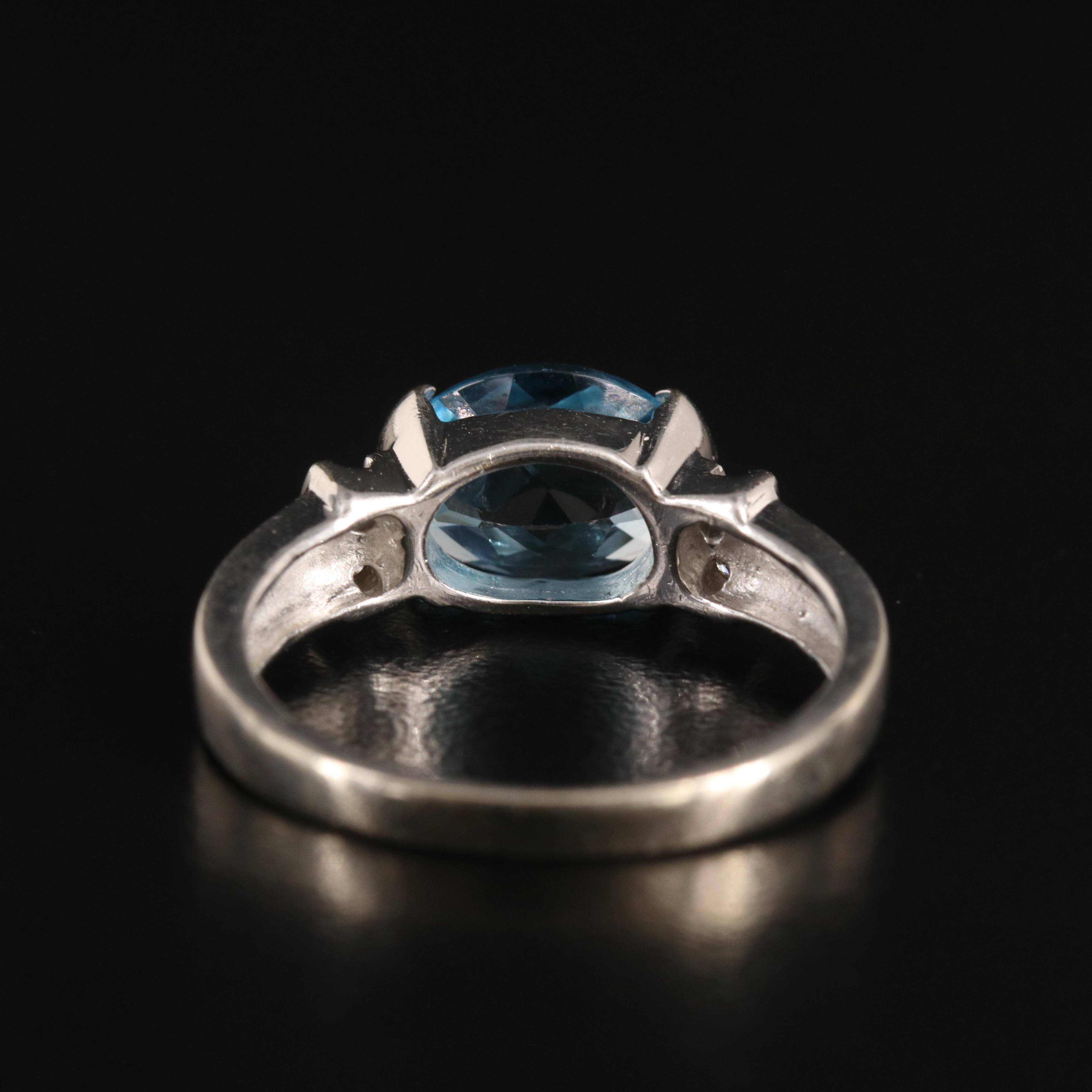 14K Swiss Blue Topaz and Diamond Ring