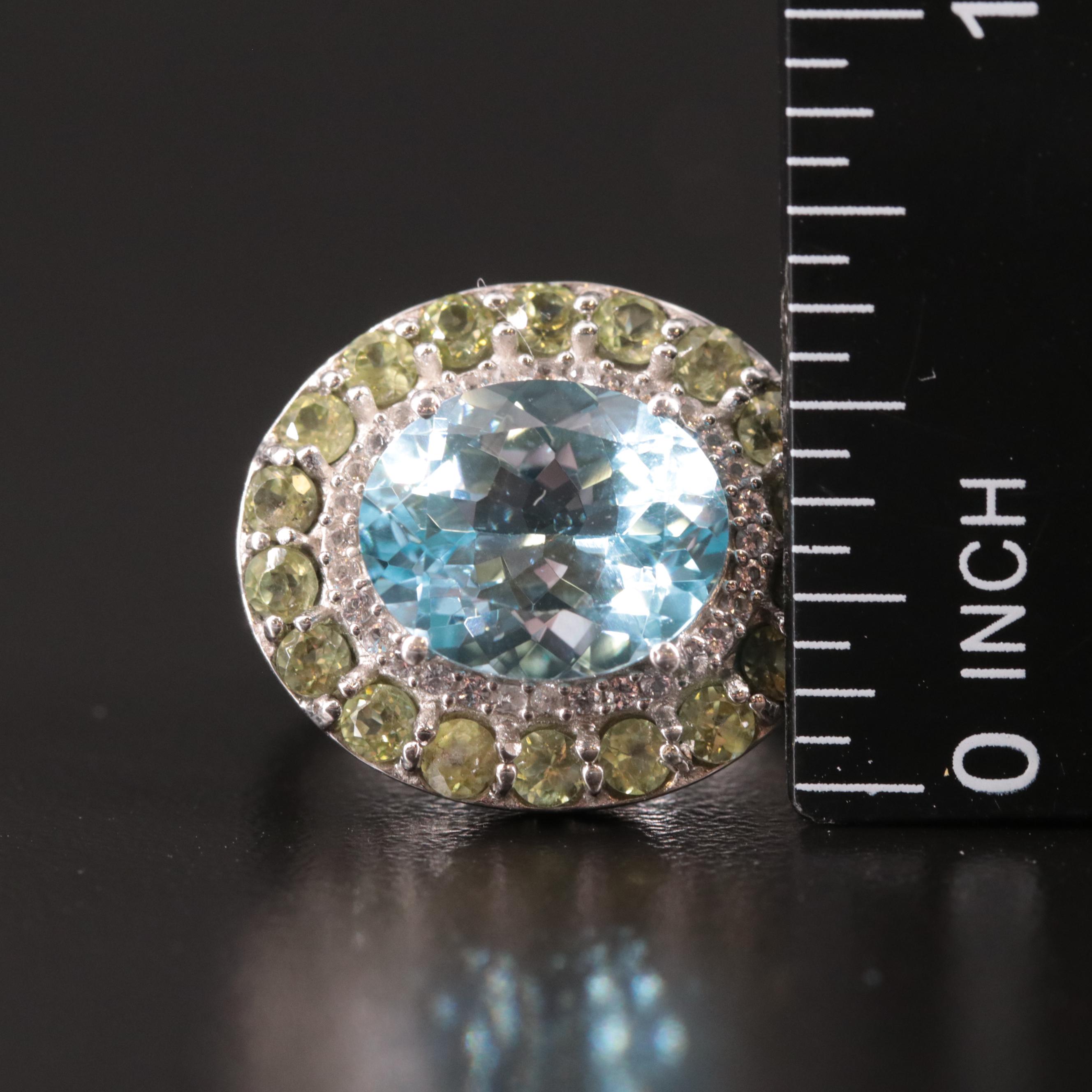 Sterling Peridot, Blue, and White Topaz Ring