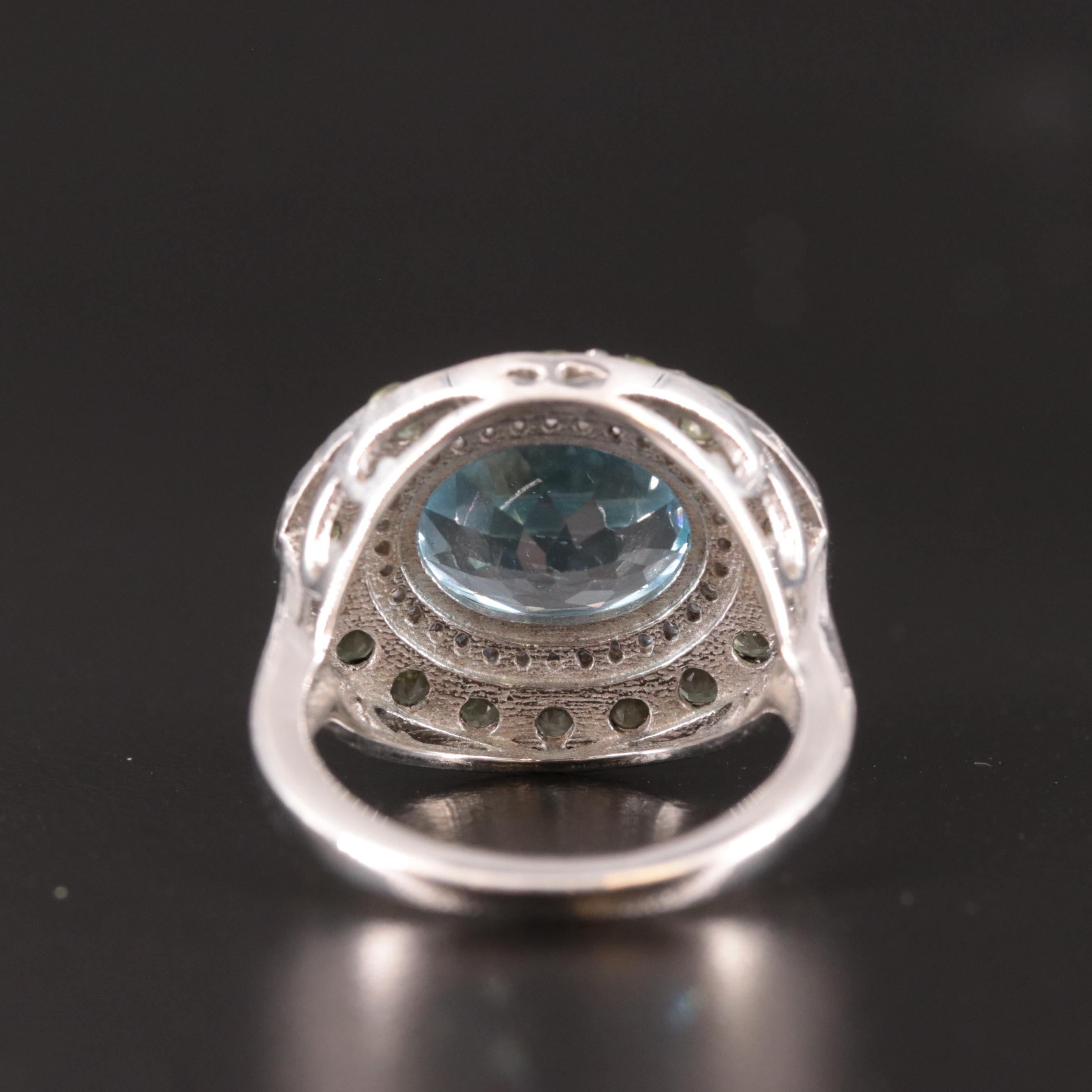 Sterling Peridot, Blue, and White Topaz Ring