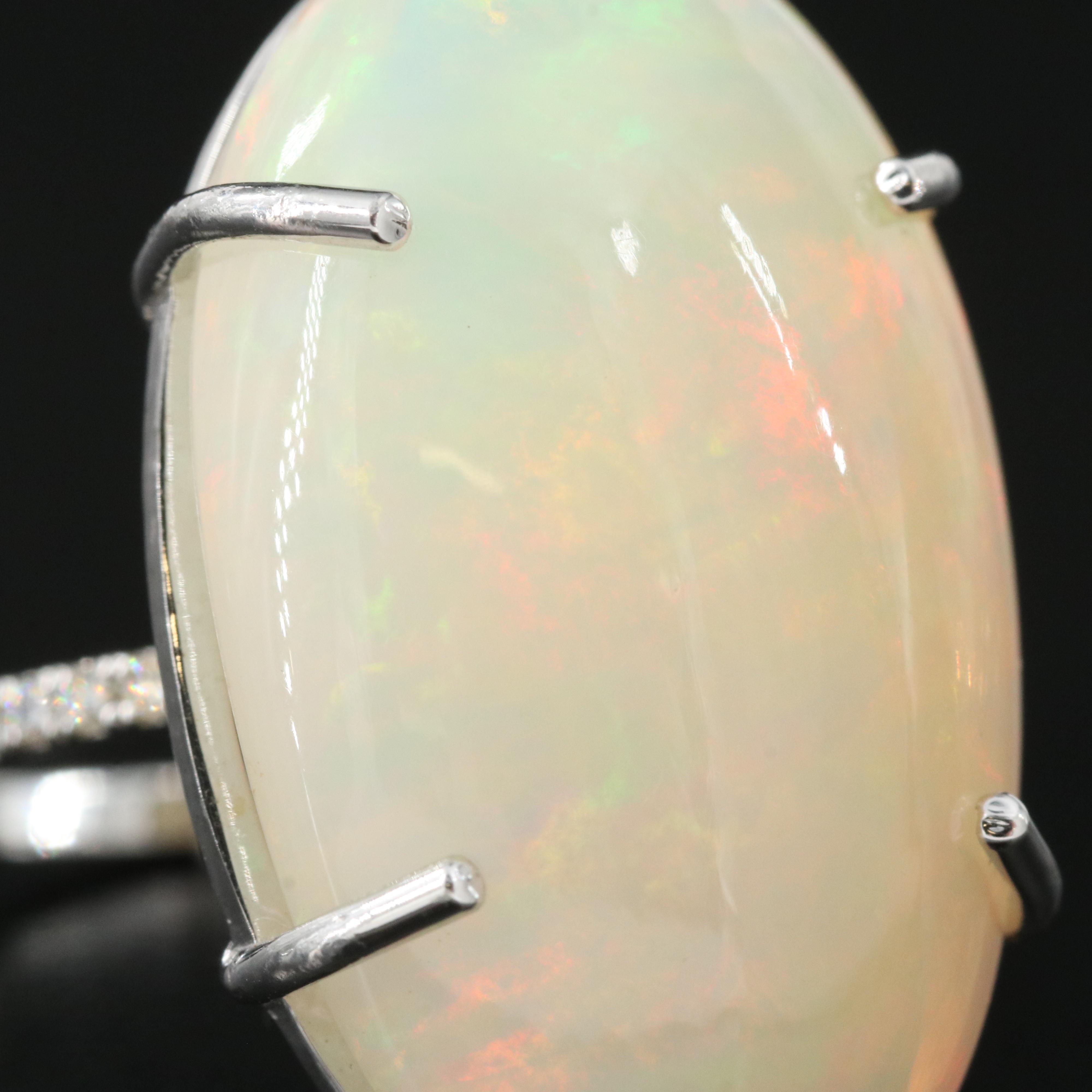 14K 21.76 CT Opal and Diamond Ring