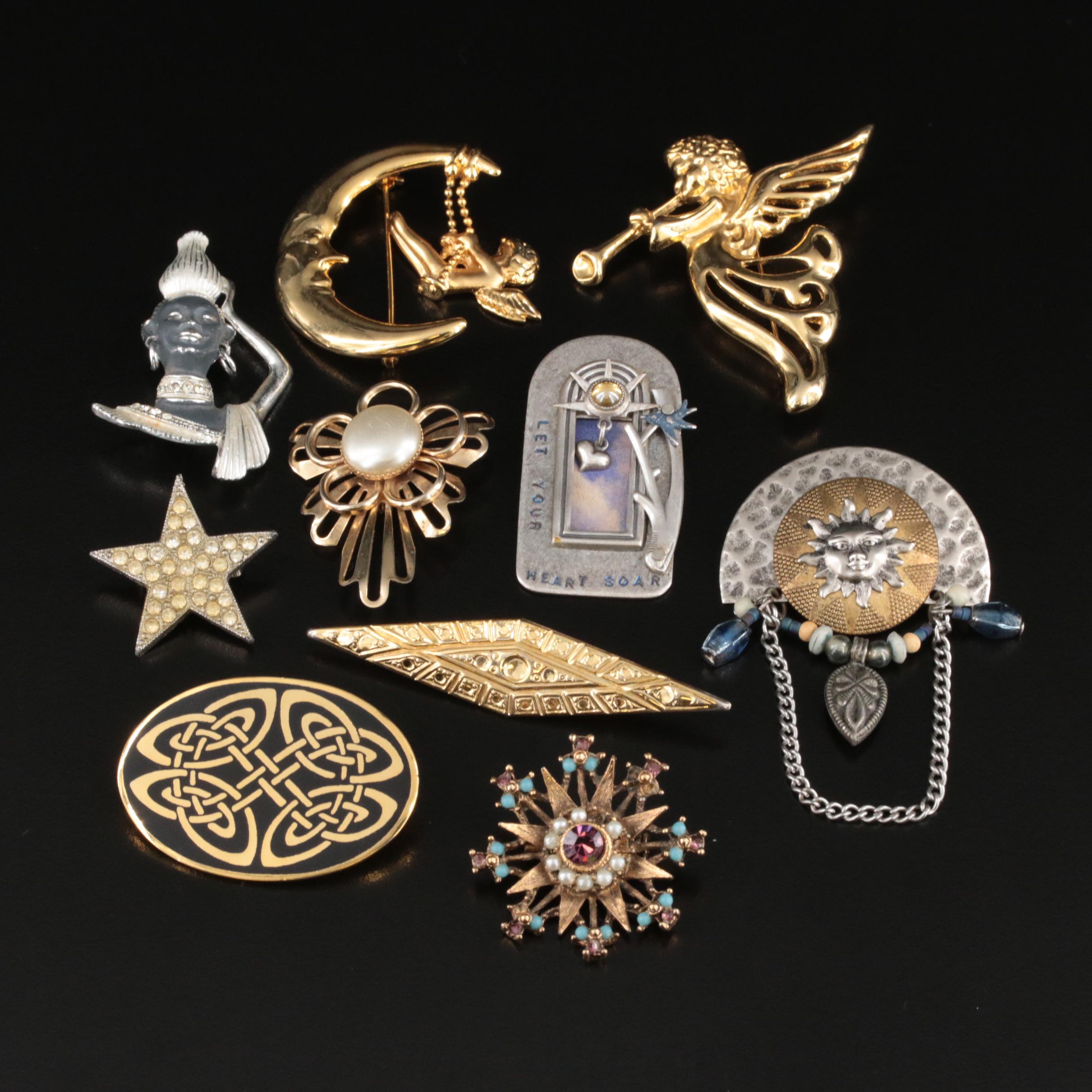Vintage Brooches Including Man in the Moon and Celtic Knot