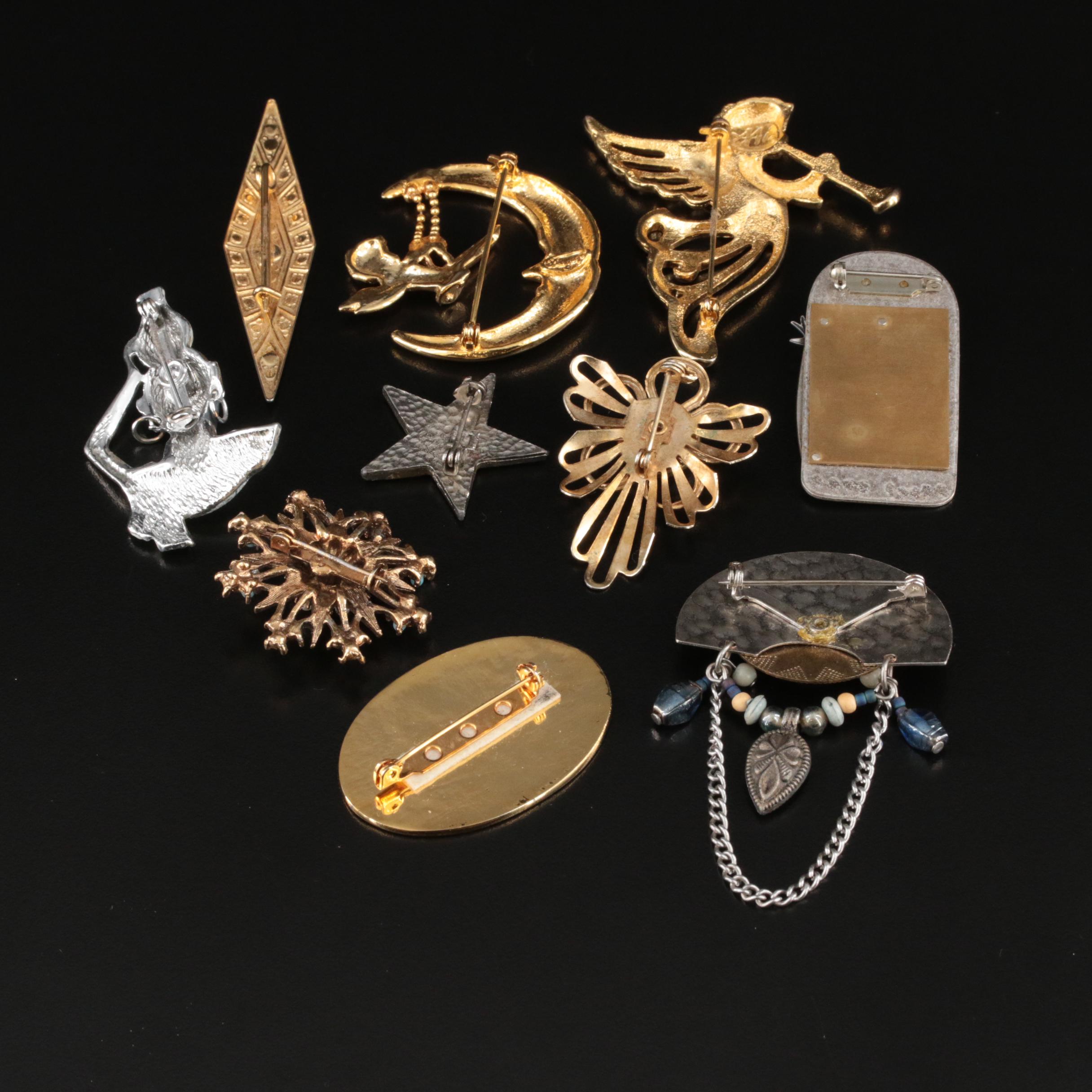 Vintage Brooches Including Man in the Moon and Celtic Knot