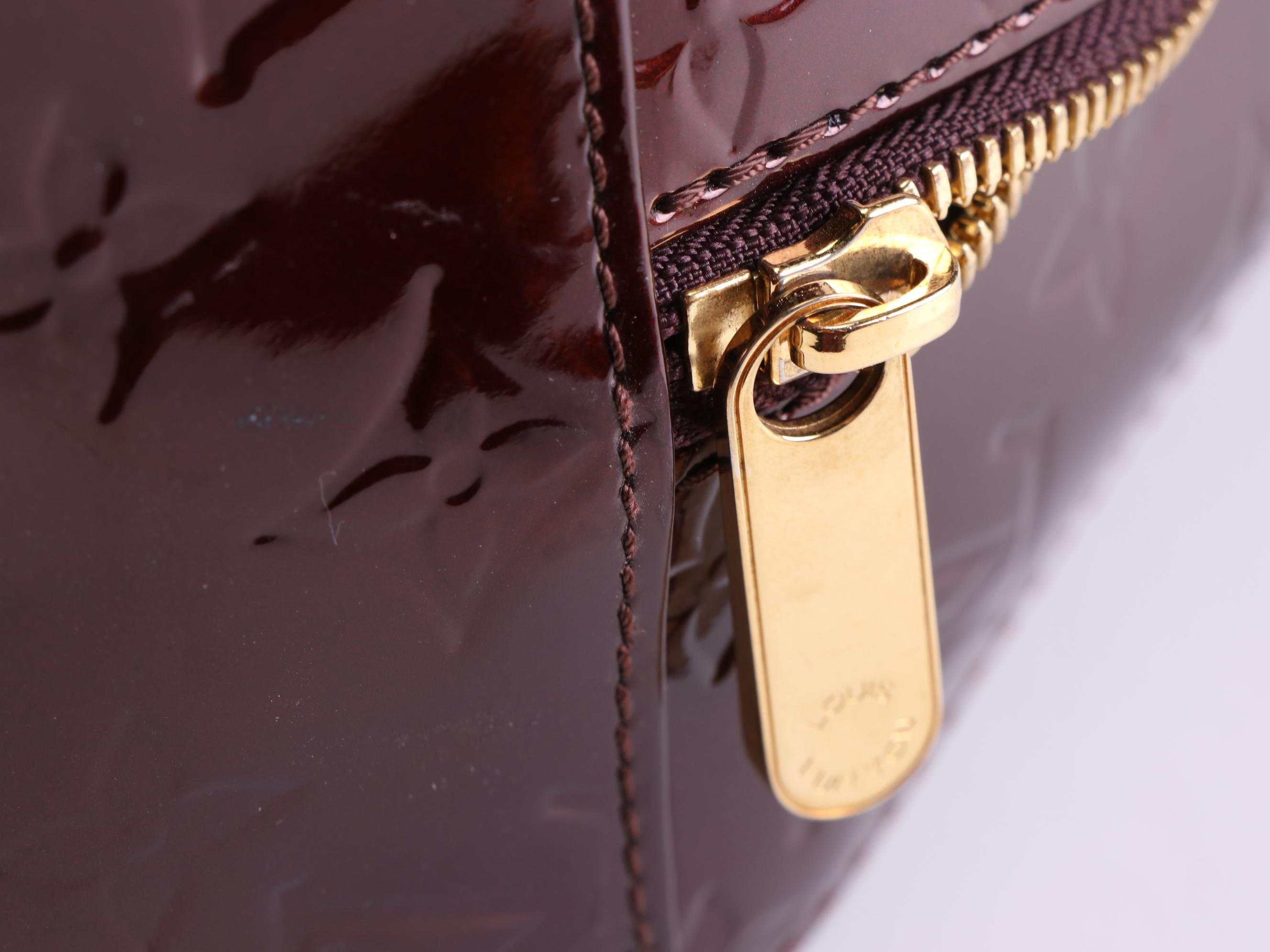 Louis Vuitton Summit Drive in Amarante Monogram Vernis