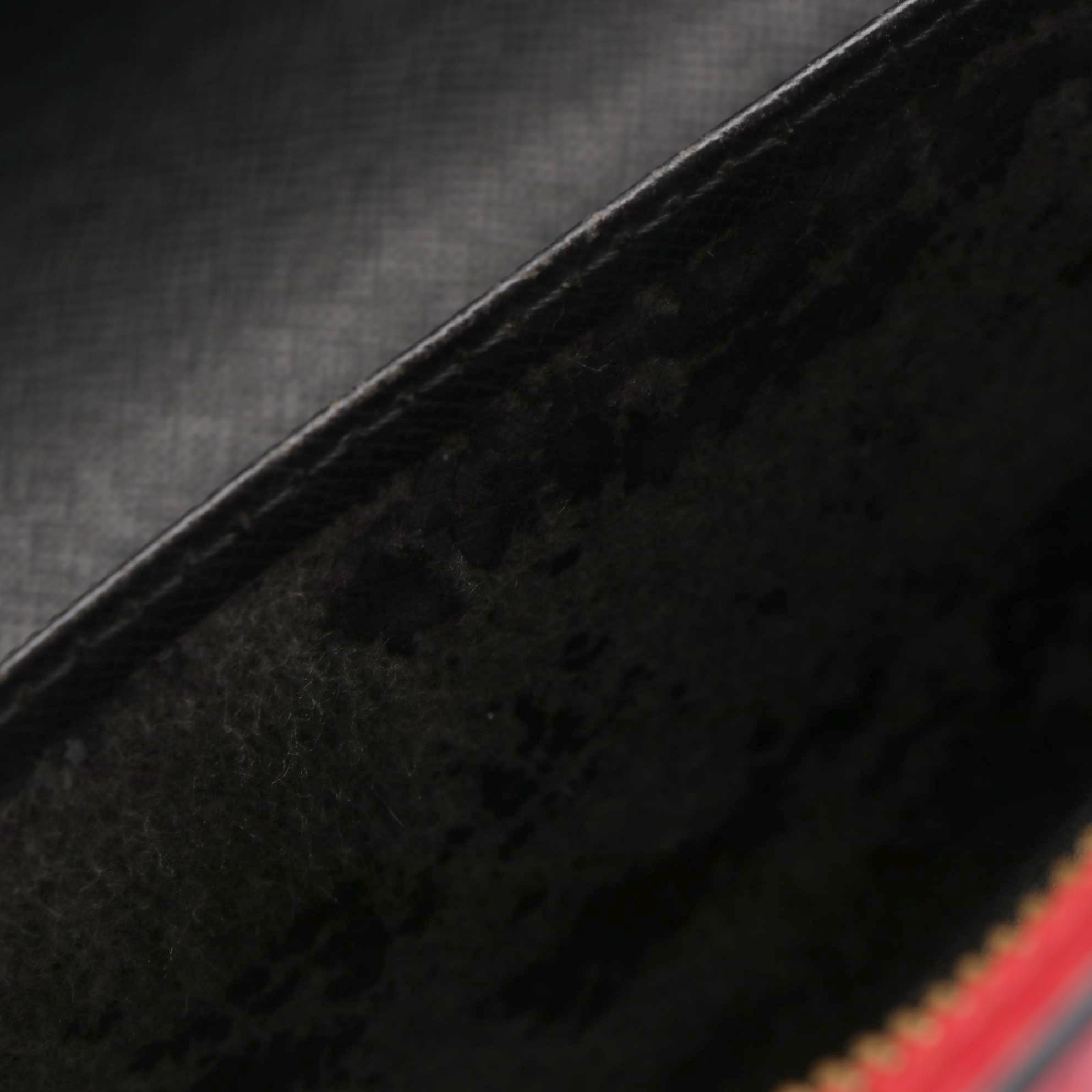 Louis Vuitton Sac Triangle Handbag in Red Epi Leather