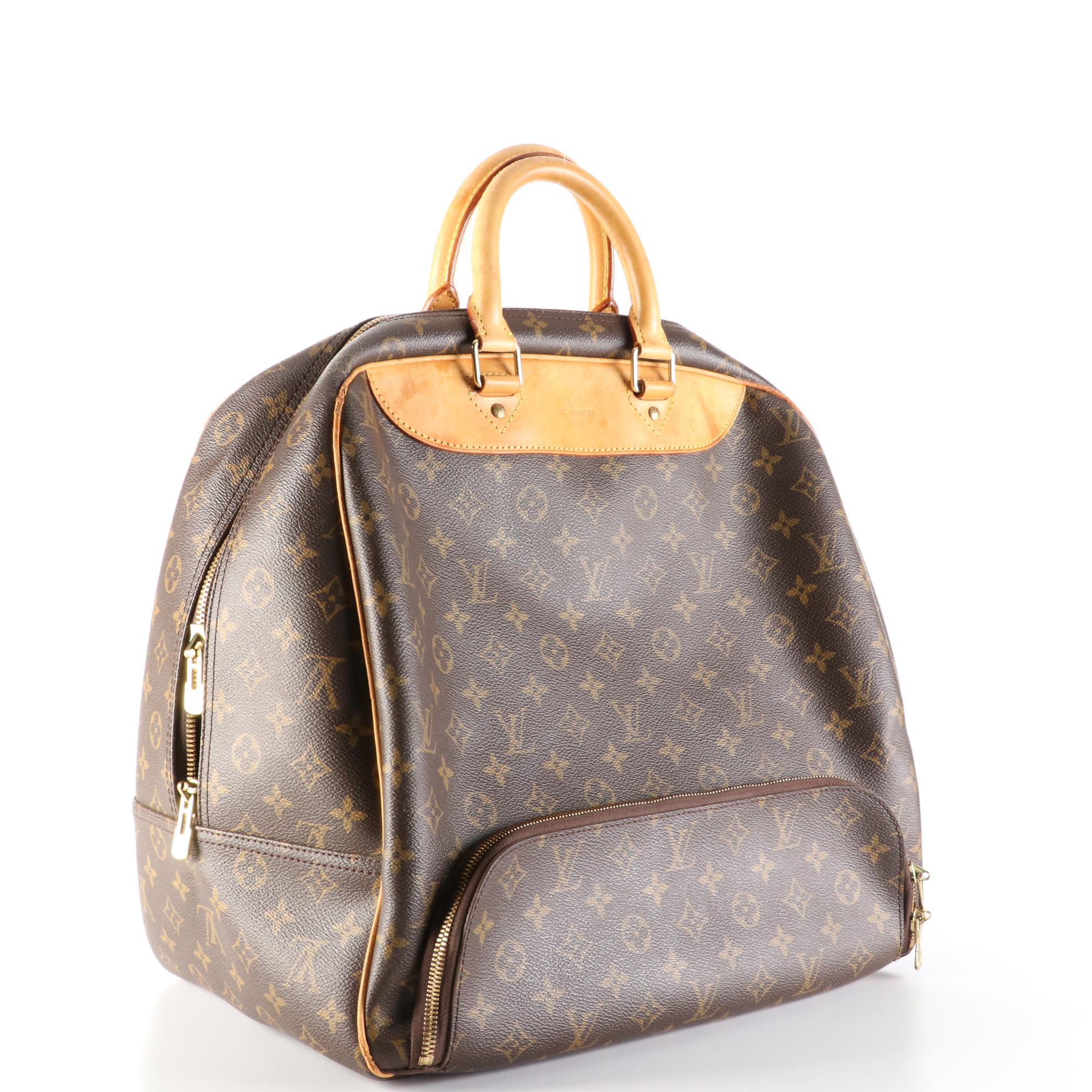 Louis Vuitton Evasion Travel Bag in Monogram Canvas and Vachetta Leather