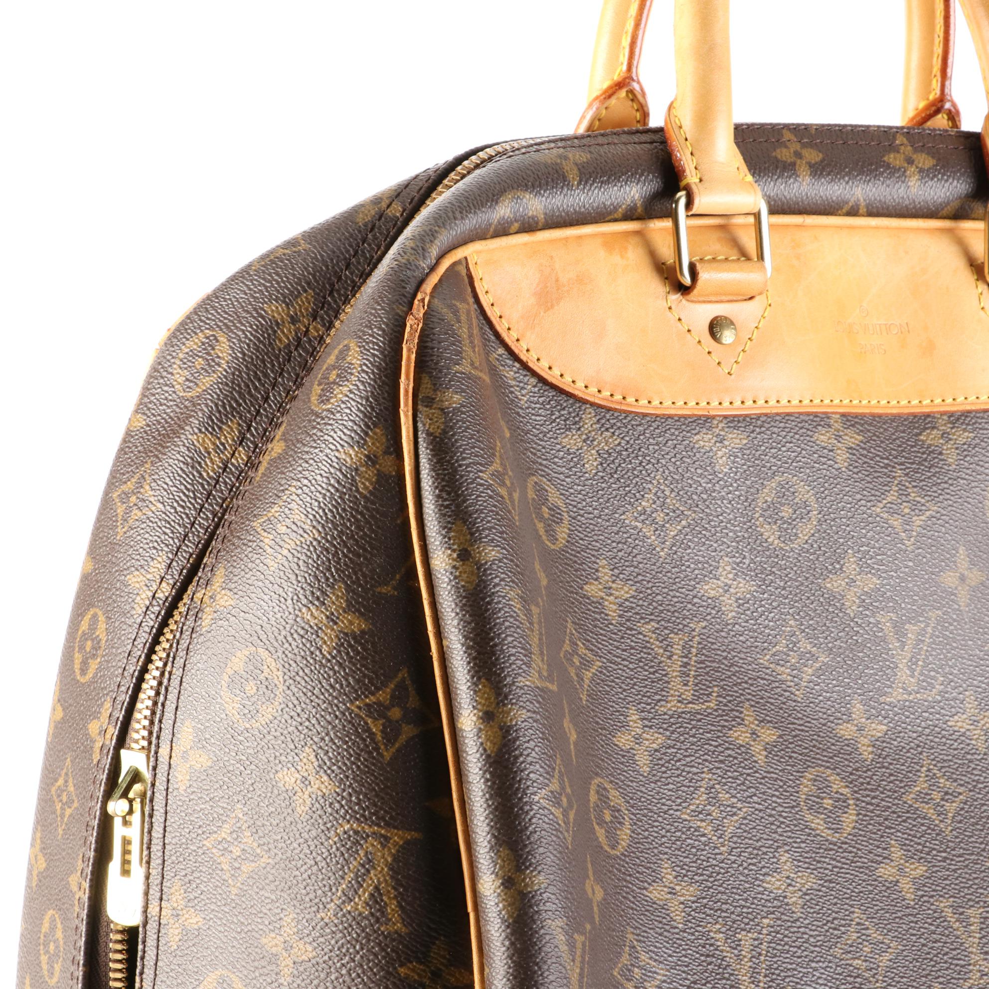 Louis Vuitton Evasion Travel Bag in Monogram Canvas and Vachetta Leather