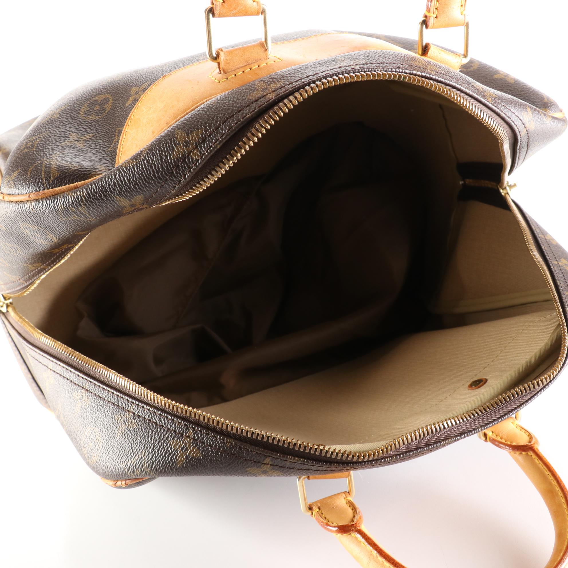 Louis Vuitton Evasion Travel Bag in Monogram Canvas and Vachetta Leather