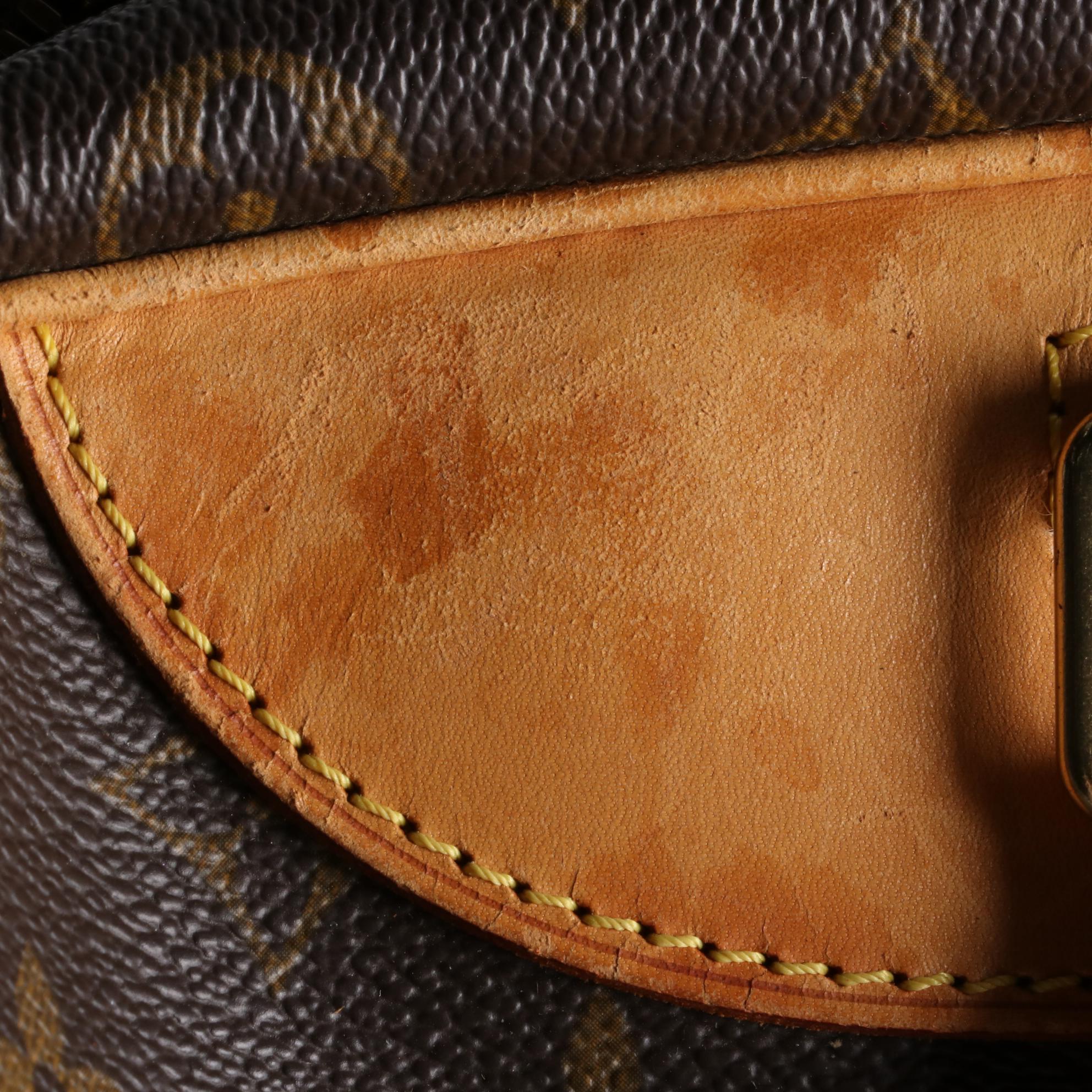 Louis Vuitton Evasion Travel Bag in Monogram Canvas and Vachetta Leather