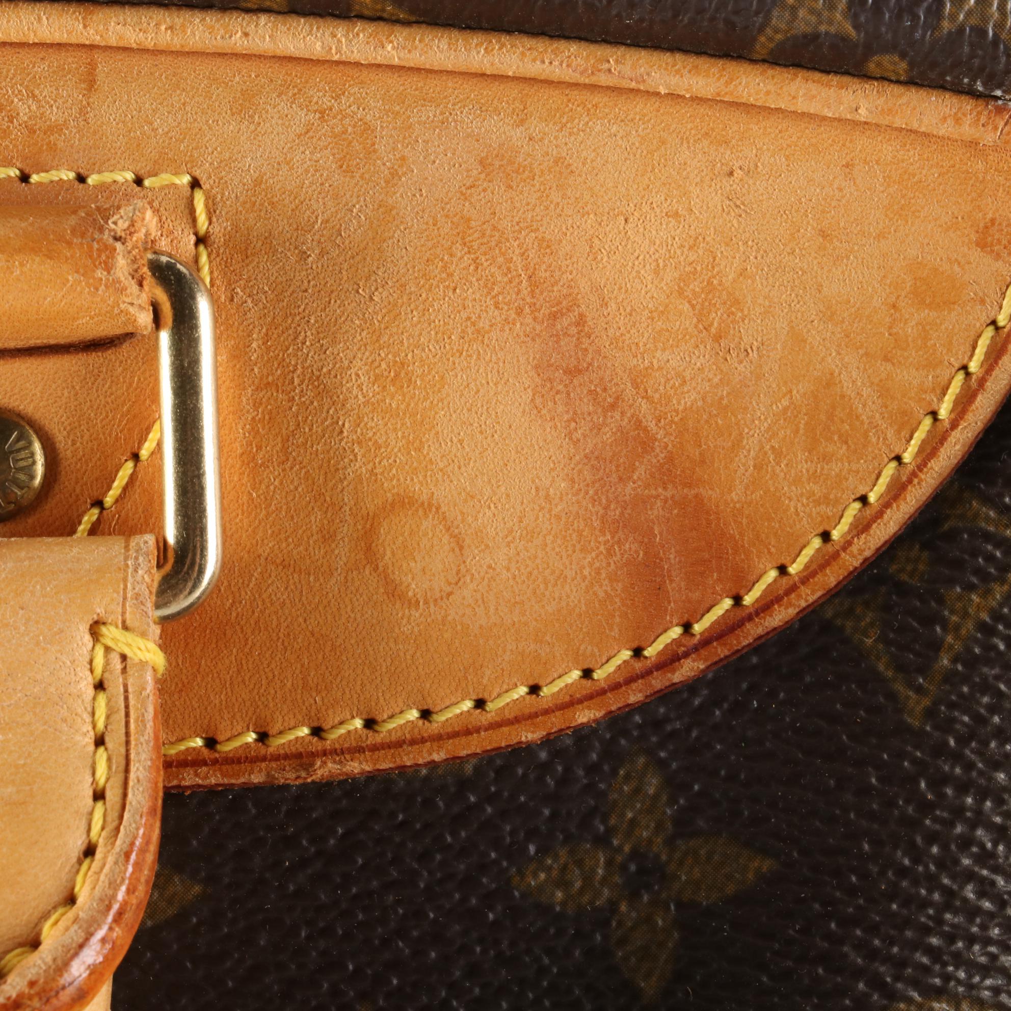 Louis Vuitton Evasion Travel Bag in Monogram Canvas and Vachetta Leather