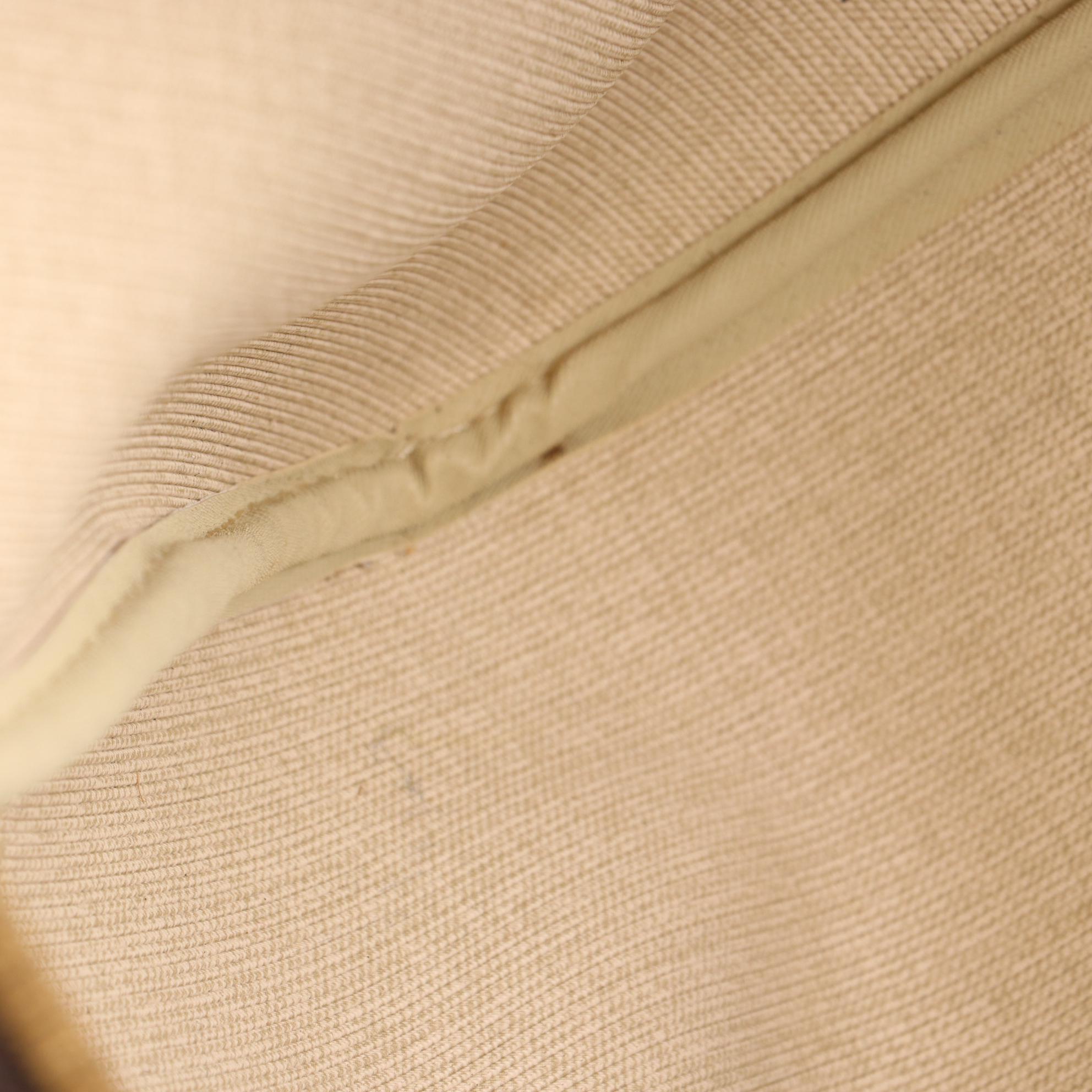 Louis Vuitton Evasion Travel Bag in Monogram Canvas and Vachetta Leather