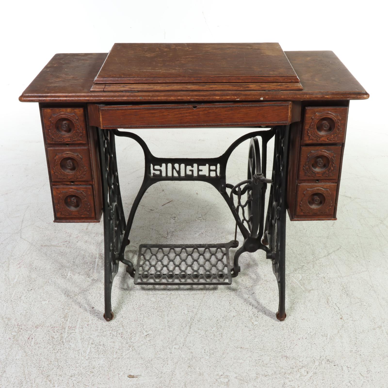 Singer Treadle-Wheel Sewing Machine with Oak and Iron Cabinet, Early 20th C.