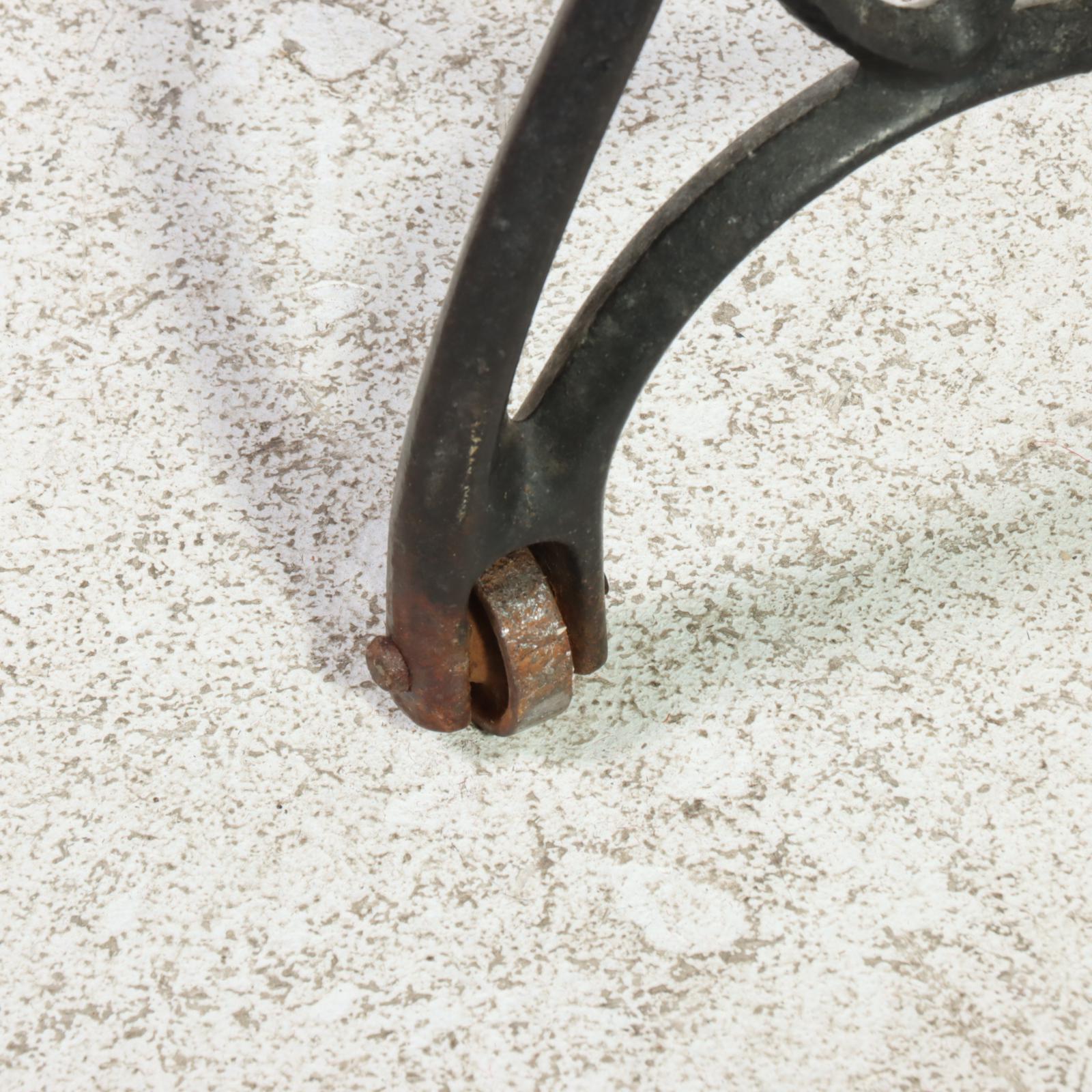 Singer Treadle-Wheel Sewing Machine with Oak and Iron Cabinet, Early 20th C.